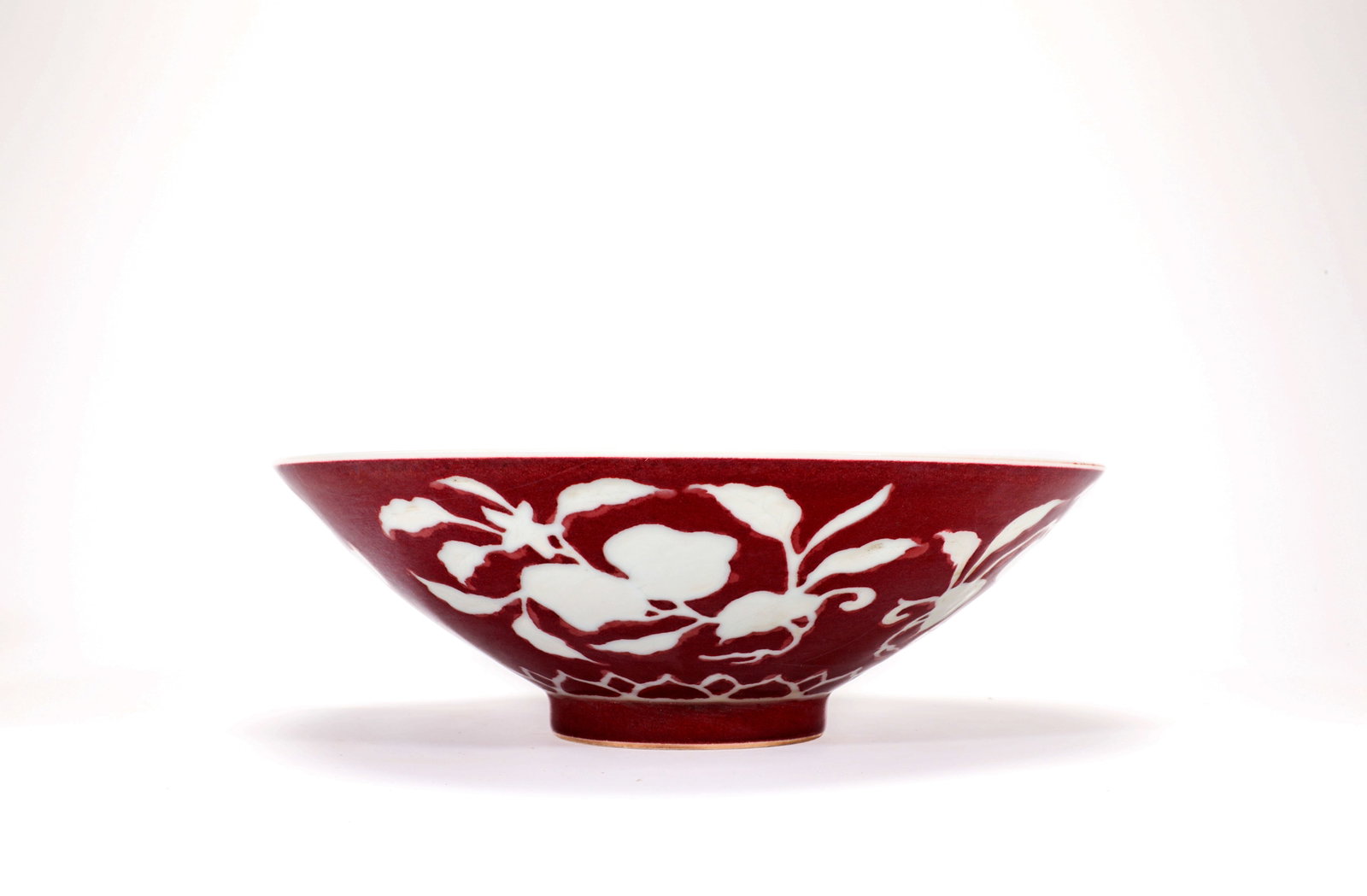 A RED GROUND RESERVED WHITE FLOWER AND FRUIT BOWL (1 of 8)