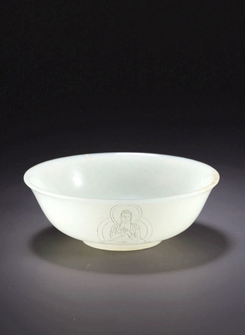 A HETIAN JADE BOWL WITH 'THREE BUDDHAS' MOTIFS (1 of 9)