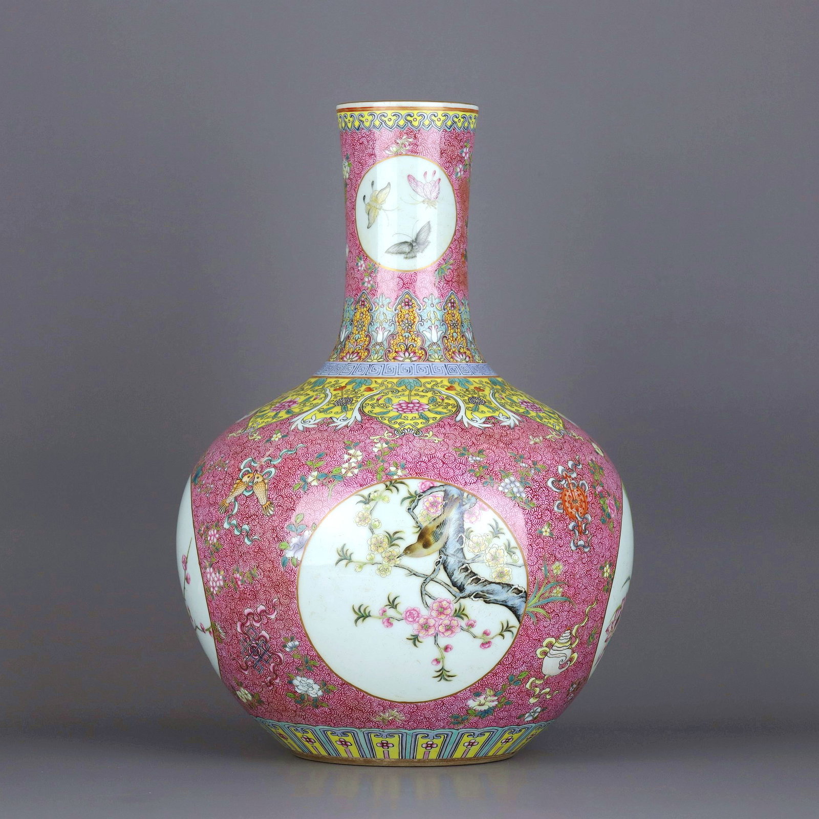 A RUBY-GROUND ENAMELLED FLOWER AND BIRD TIANQIUPING: A RUBY-GROUND ENAMELLED FLOWER AND BIRD TIANQIUPING Size:Height:37.4cm,Diam:26.5cm