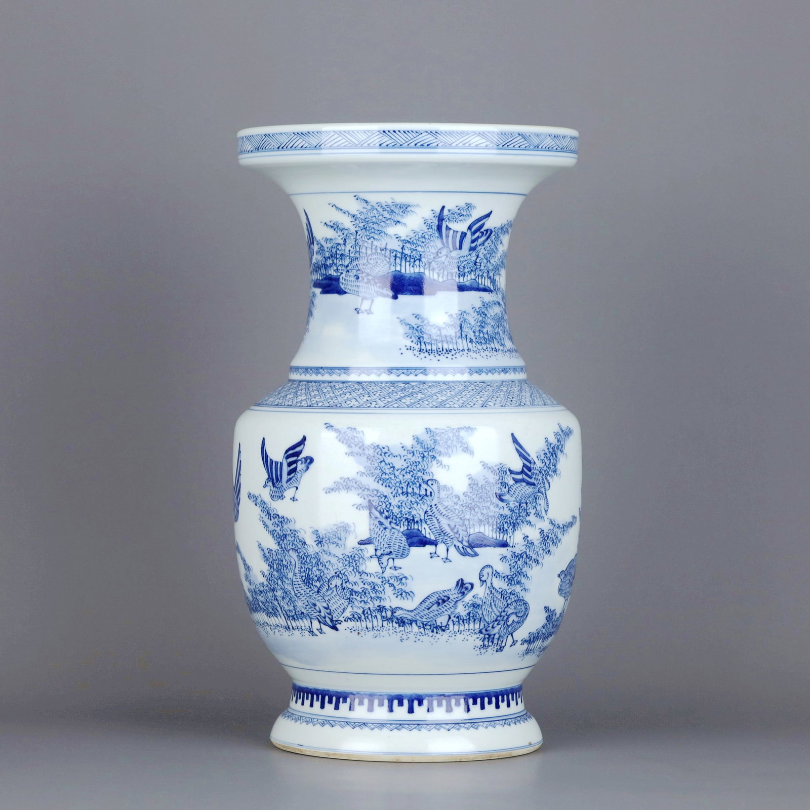 A BLUE AND WHITE BAMBOO AND BIRD DISH-MOUTH VASE: A BLUE AND WHITE BAMBOO AND BIRD DISH-MOUTH VASE Size:Height:33cm,Diam:19cm