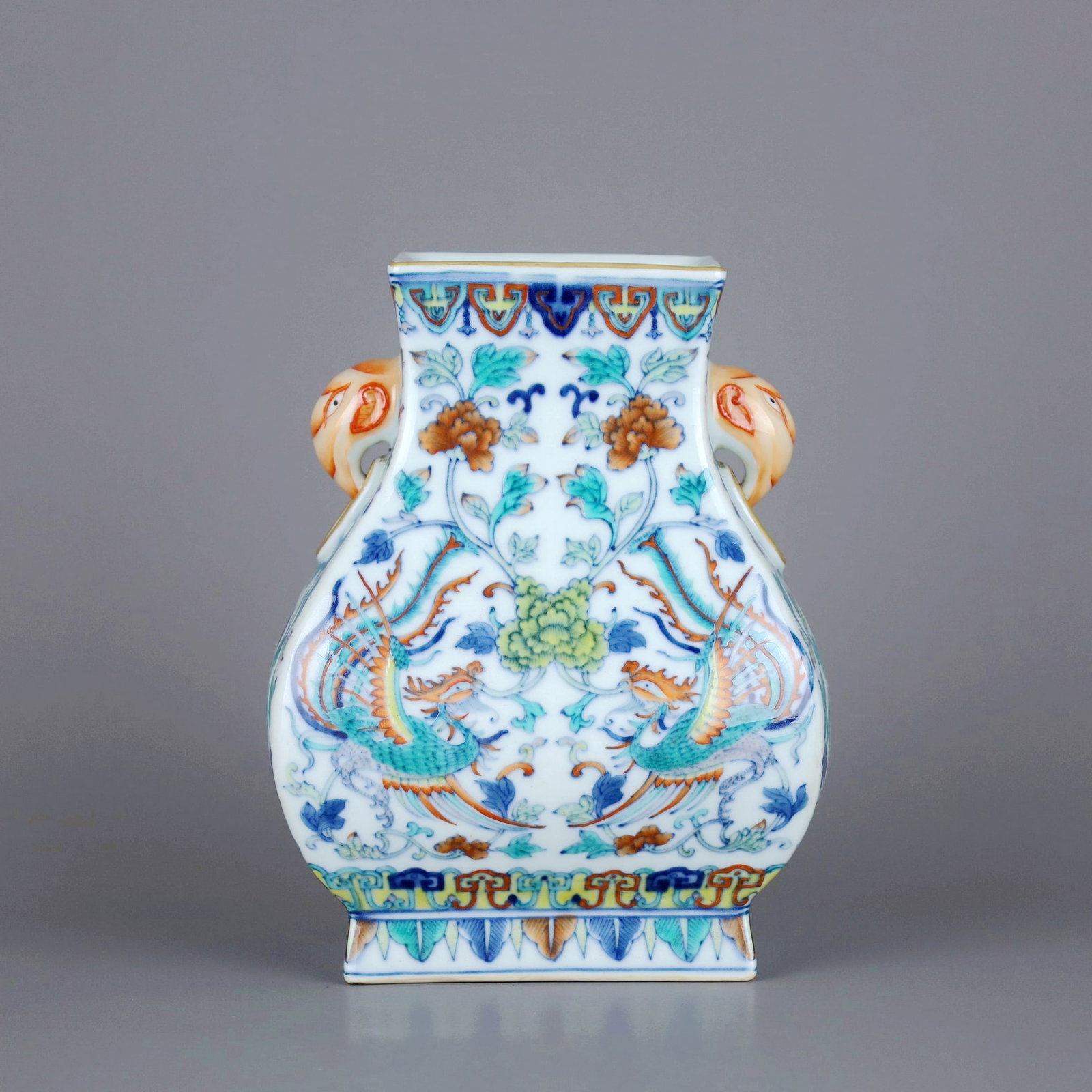 A DOUCAI DOUBLE PHOENIX PEONY ANIMAL-EAR SQUARE VASE,ZUN: A DOUCAI DOUBLE PHOENIX PEONY ANIMAL-EAR SQUARE VASE,ZUN Size:Height:16.5cm,Diam:13cm