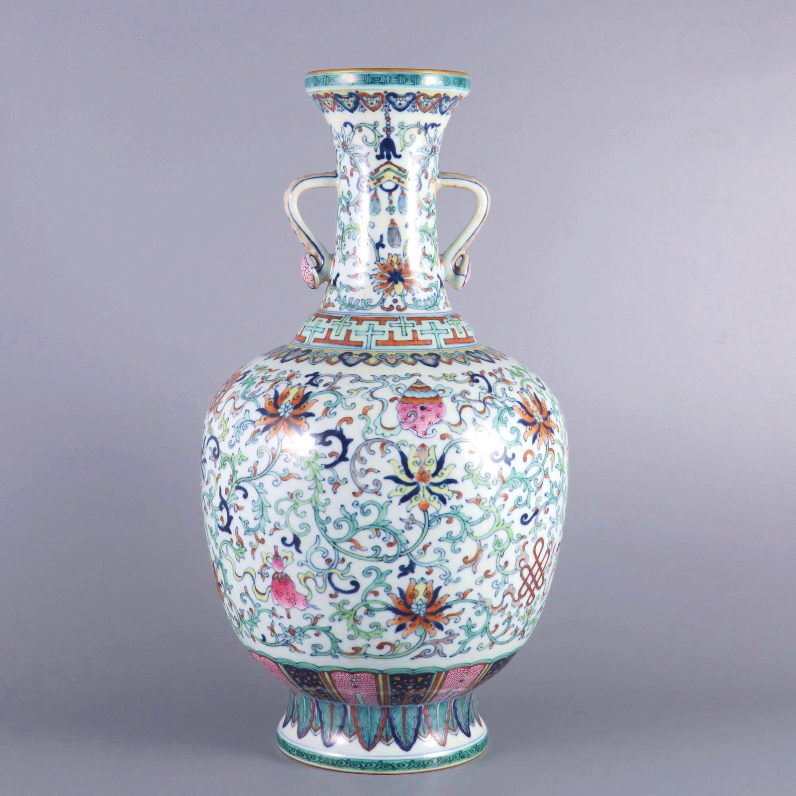 A DOUCAI LOTUS SCROLL EIGHT TREASURES RUYI EAR APPRECIATION VASE: A DOUCAI LOTUS SCROLL EIGHT TREASURES RUYI EAR APPRECIATION VASE Size:Height:39cm,Diam:20.5cm