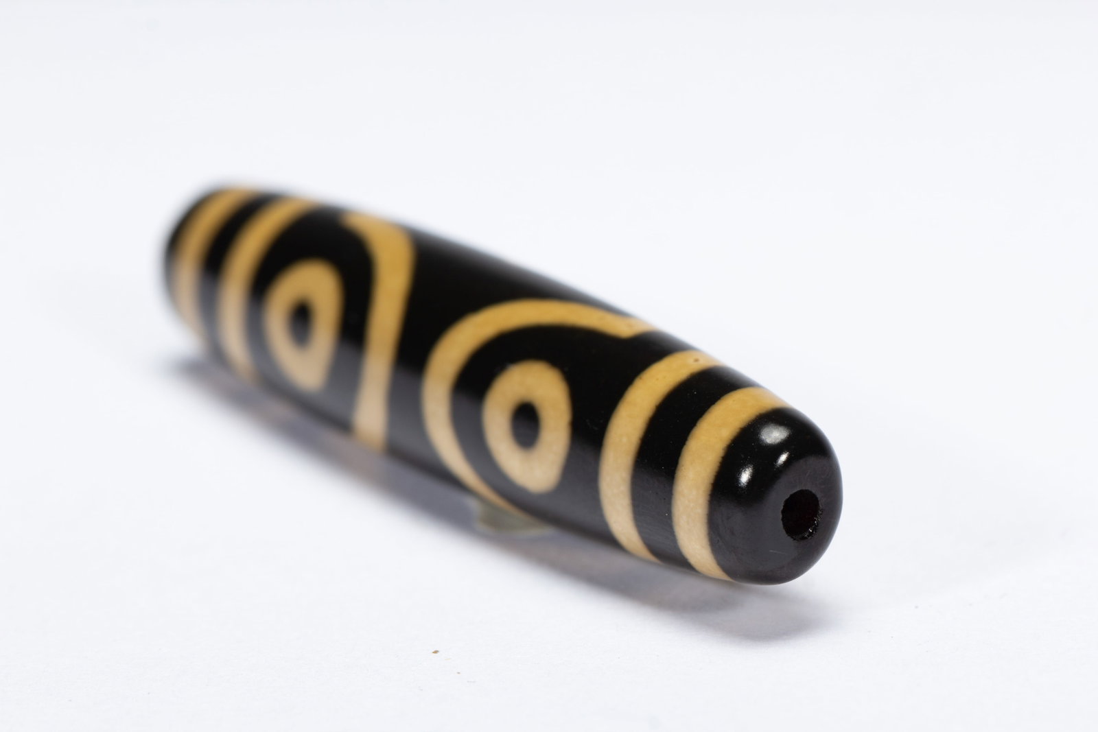 A CHINESE SINGLE SQUARE EYE DZI BEAD - 5