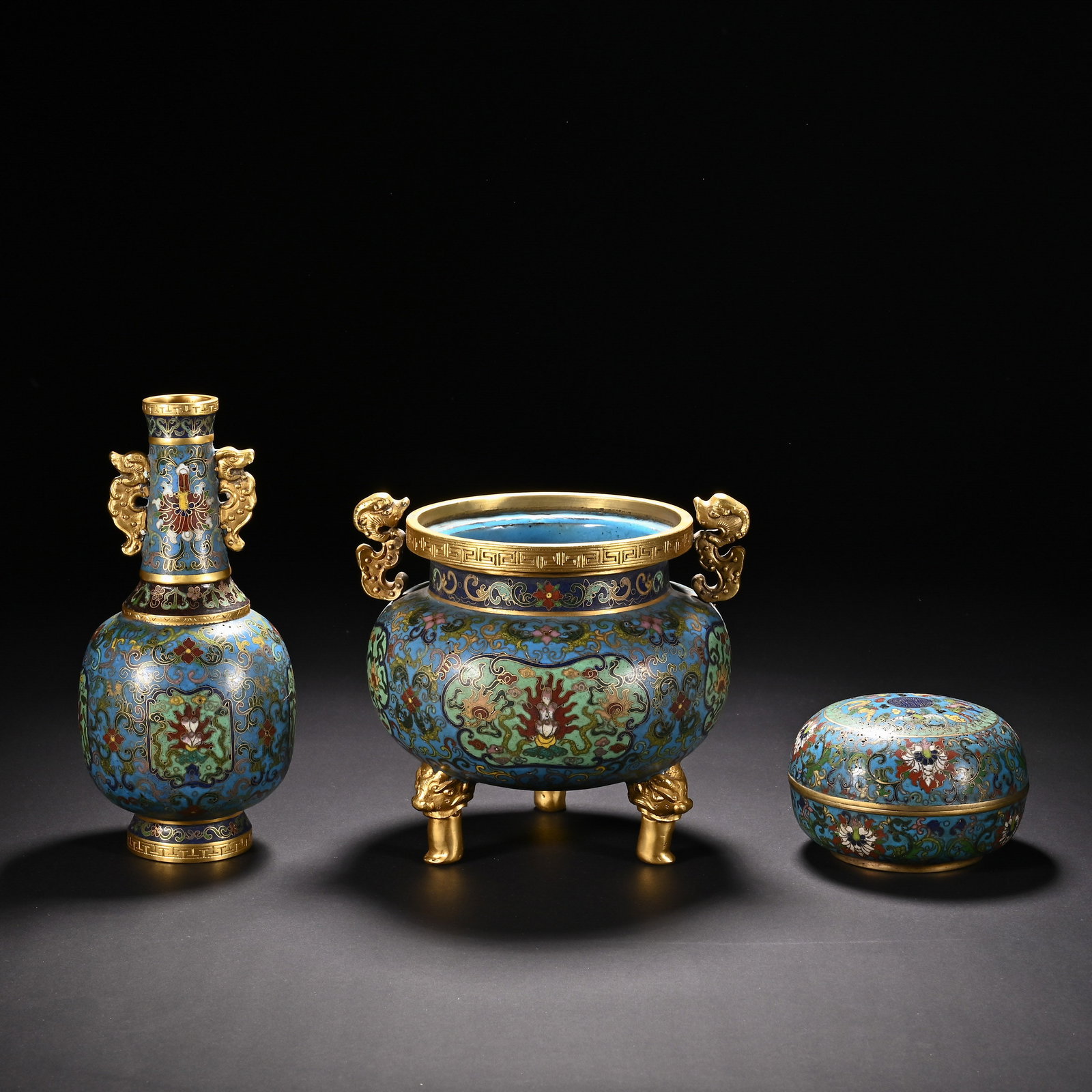 A CHINESE GILT-BRONZE CLOISONNE ENAMEL CENSER, VASE AND BOX THREE-PIECE SET (1 of 10)