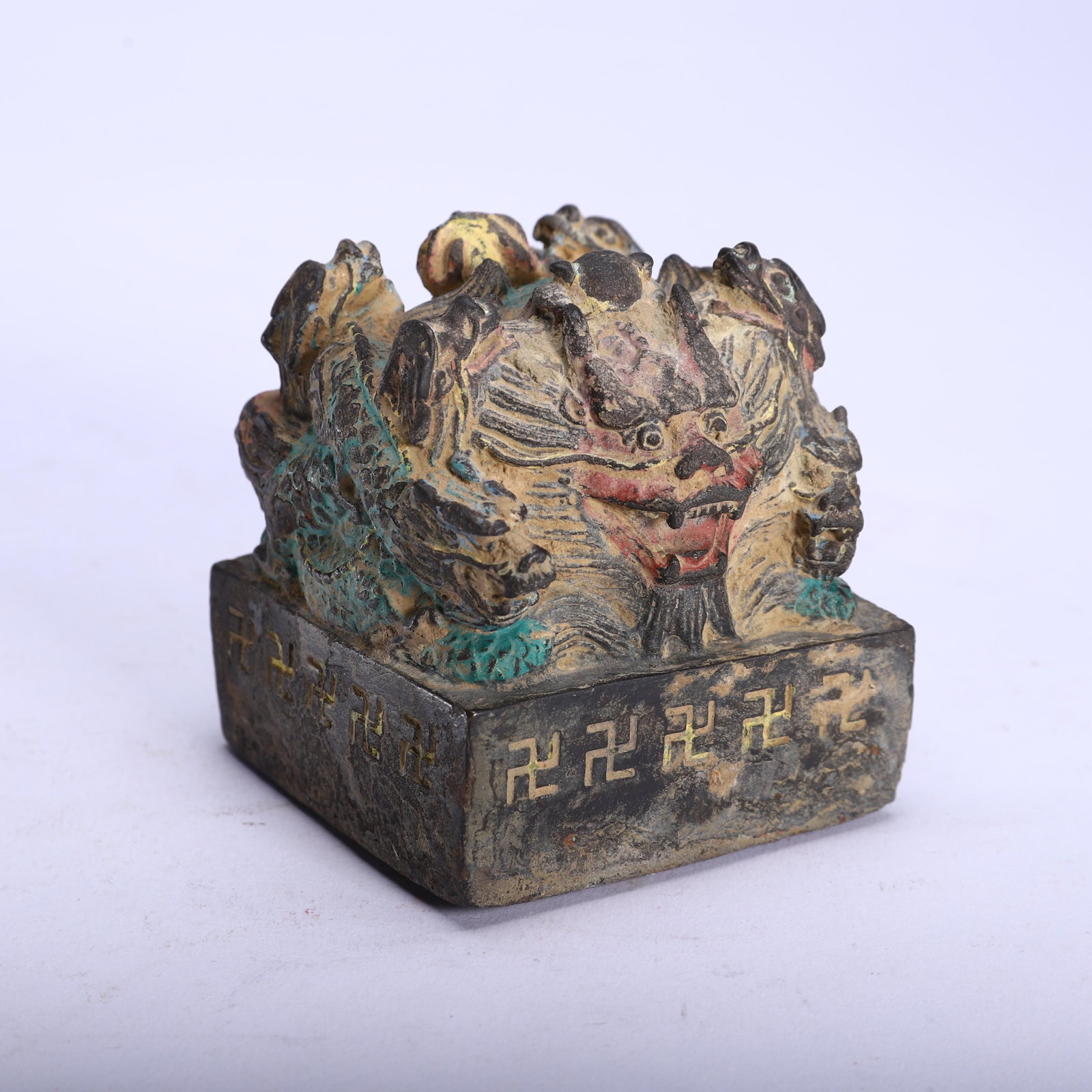 A POLYCHROME PAINTED DRAGON SEAL (1 of 9)
