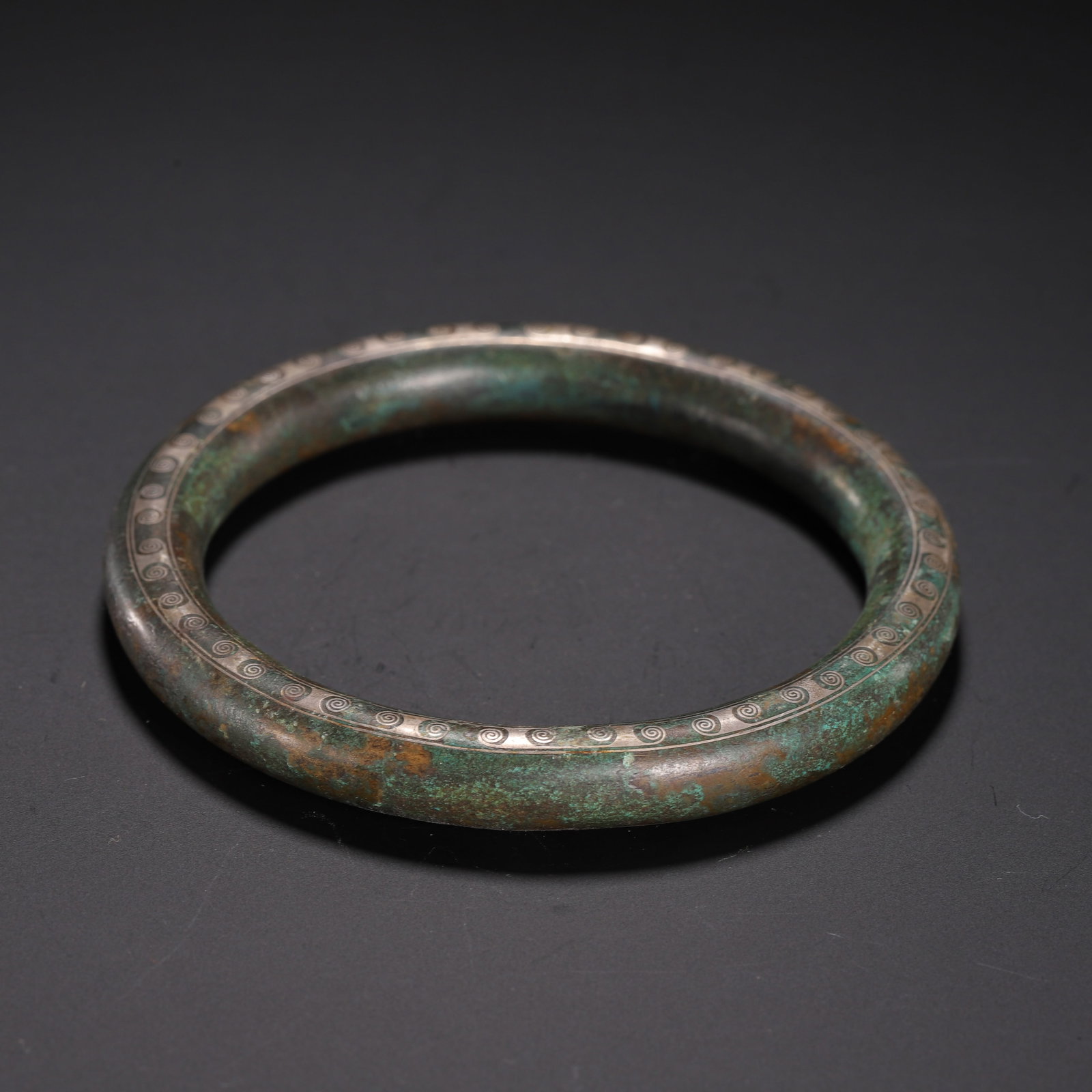 A SILVER INLAID BRONZE BANGLE - 6