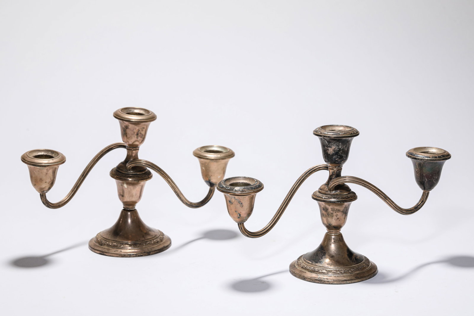 A PAIR OF SILVER CANDLEHOLDERS (1 of 7)