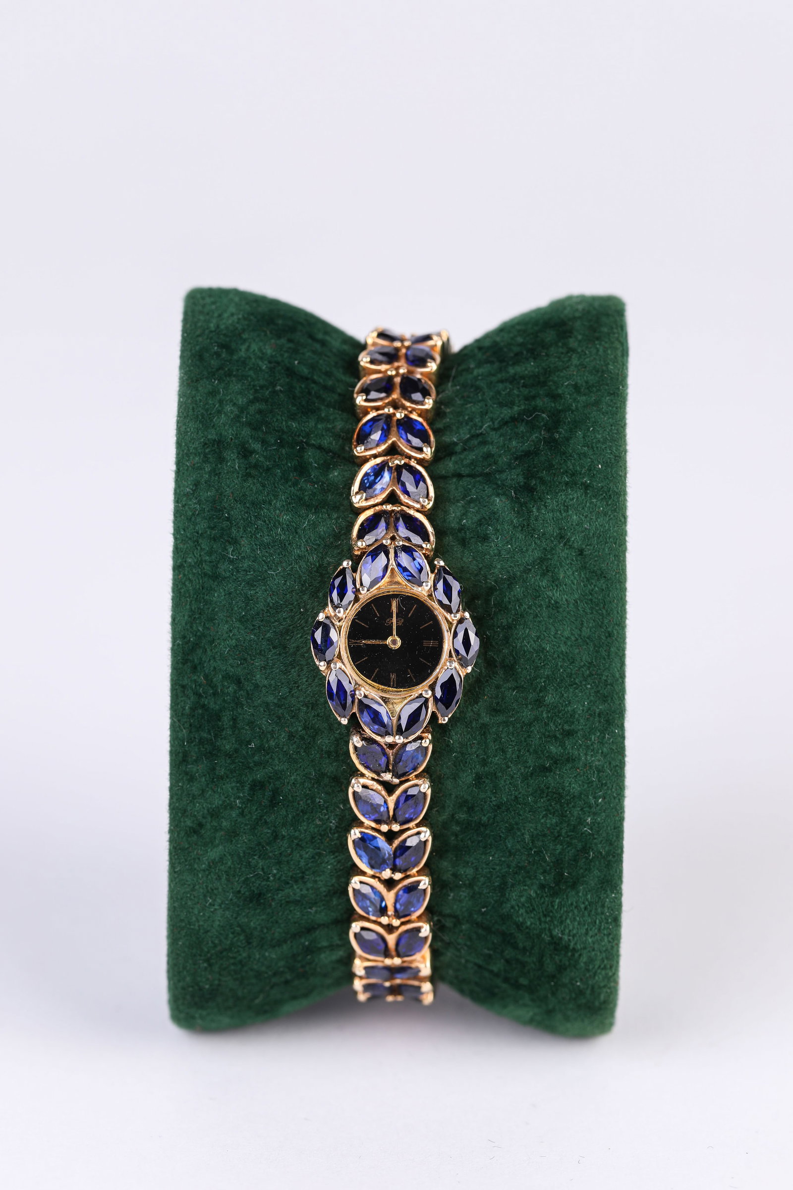 A CHOPARD CUSTOM-MADE SAPPHIRE WRISTWATCH: A CHOPARD CUSTOM-MADE SAPPHIRE WRISTWATCH Description: Dimensions: Width: 16 mm. All measurements are approximate.