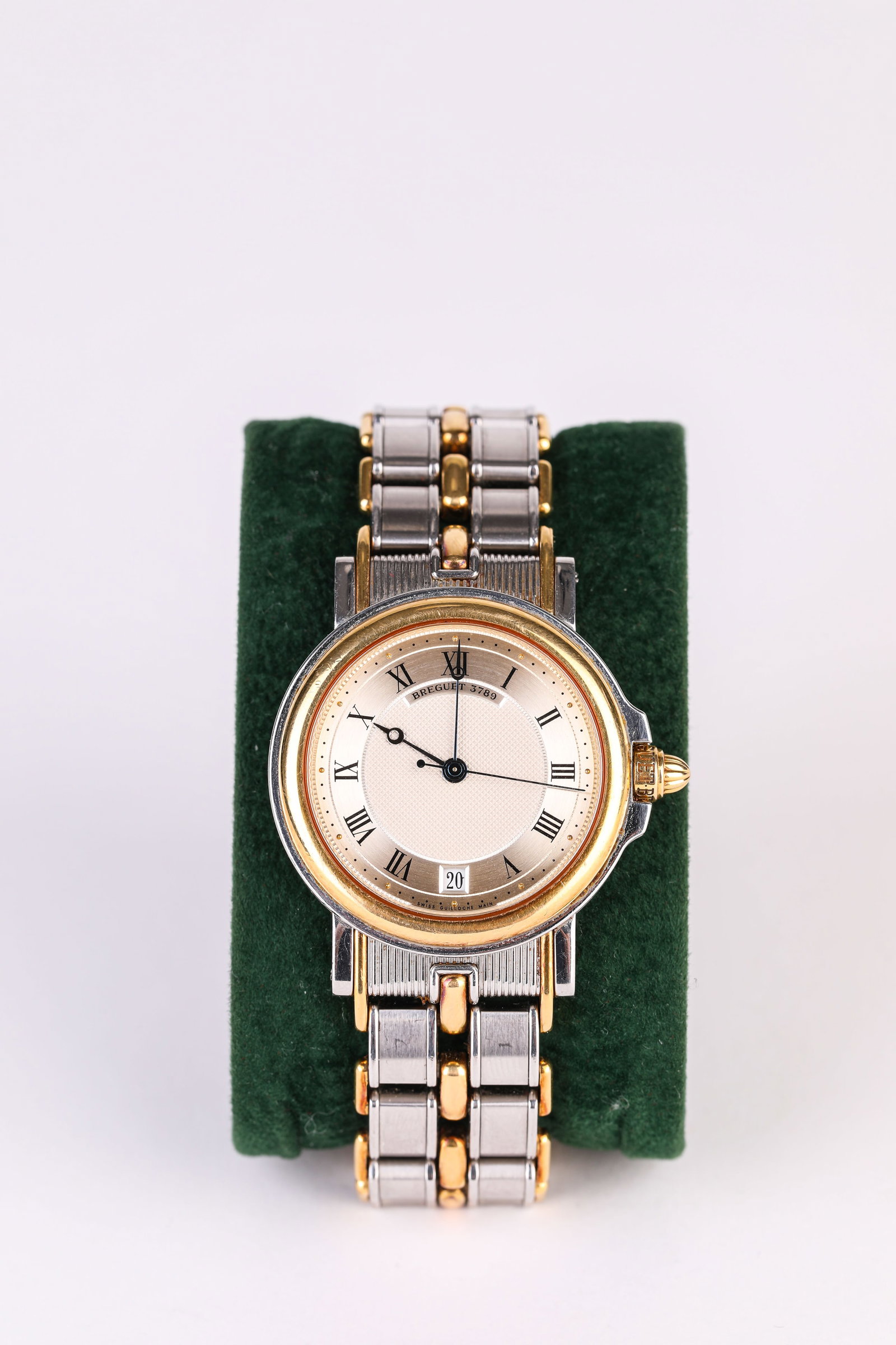 A BREGUET GOLD MECHANICAL WRISTWATCH: A BREGUET GOLD MECHANICAL WRISTWATCH Description: Dimensions: Width: 40 mm. All measurements are approximate.