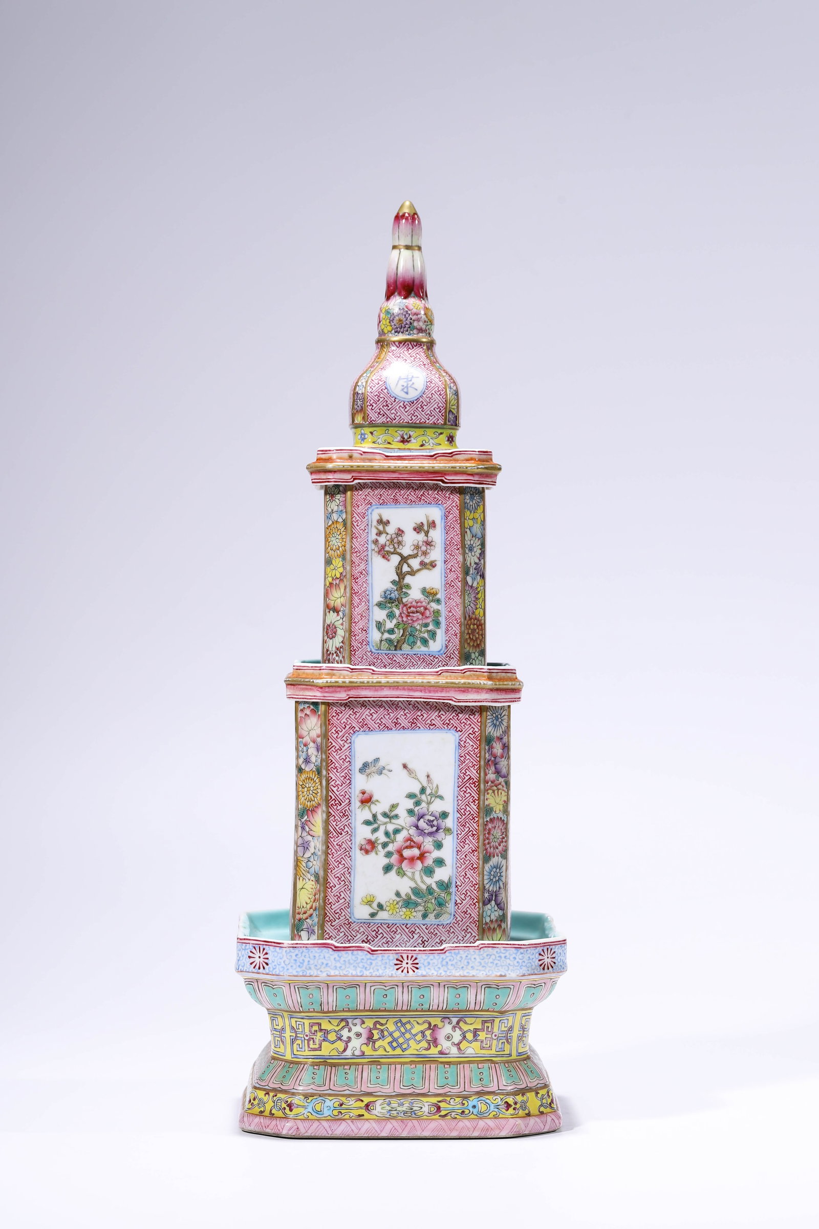 A FAMILLE-ROSE GILT-DECORATED 'FLORAL RESERVES' PAGODA: A FAMILLE-ROSE GILT-DECORATED 'FLORAL RESERVES' PAGODA Description: Dimensions: Length: 16.2 cm x Width: 16 cm x Height: 46.5 cm. All measurements are approximate.
