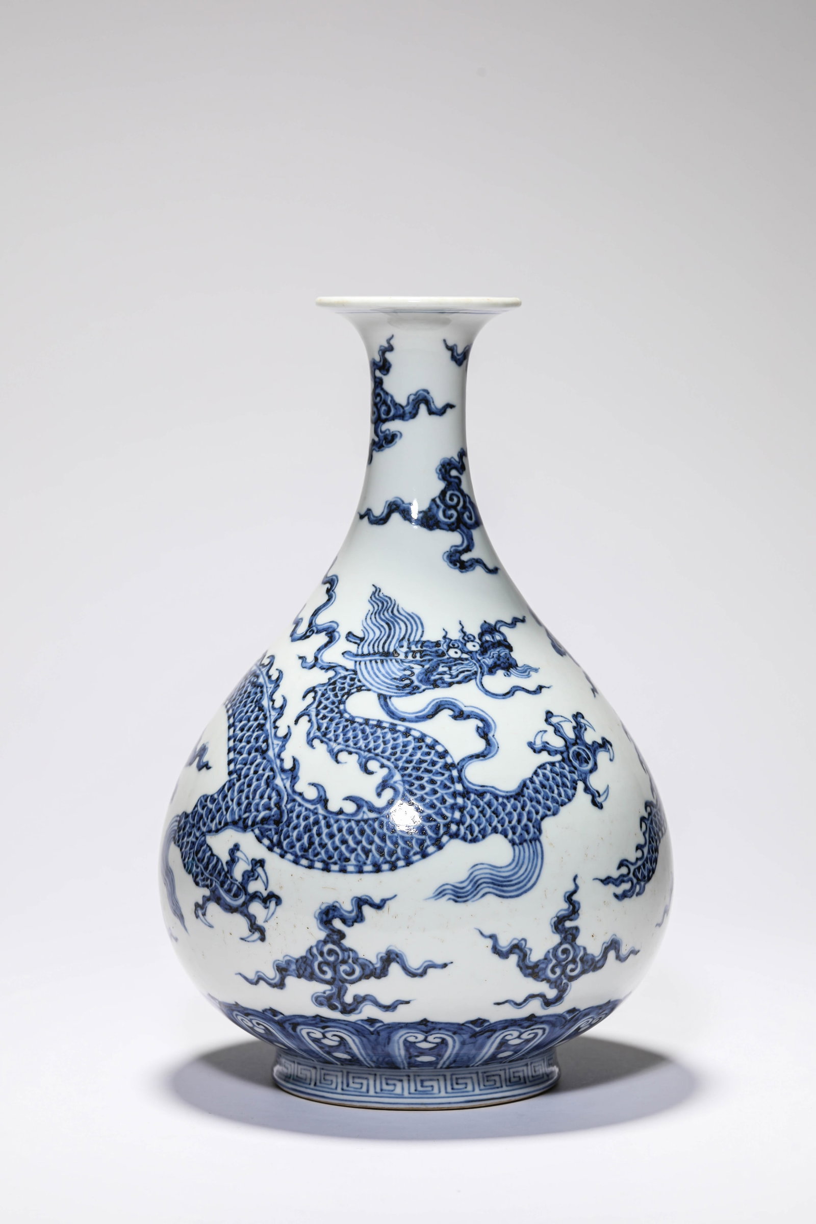 A BLUE AND WHITE 'DRAGON AND CLOUDS' YUHUCHUN (1 of 5)