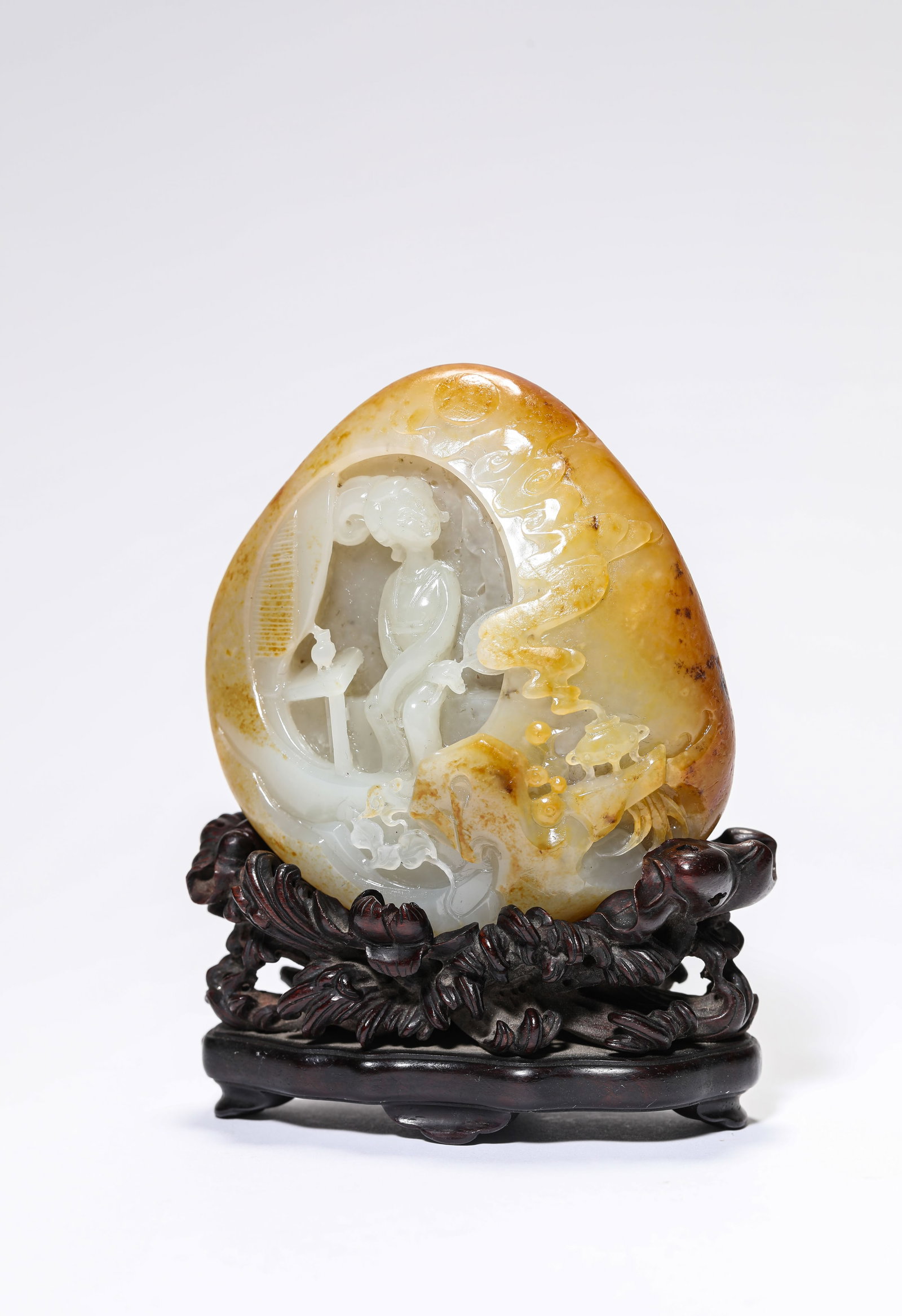 A JADE 'CARVED NARRATIVE SCENE' MOUNTAIN ORNAMENT: A JADE 'CARVED NARRATIVE SCENE' MOUNTAIN ORNAMENT Description: Dimensions: Length: 7.7 cm x Width: 3.5 cm x Height: 8 cm. All measurements are approximate.