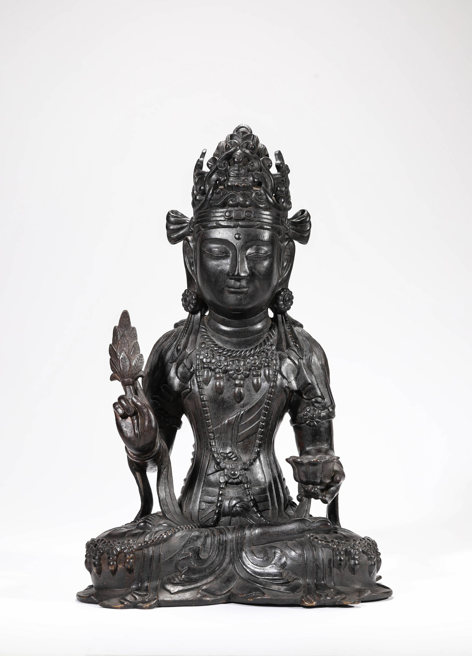 A BRONZE FIGURE OF AVALOKITESHVARA: A BRONZE FIGURE OF AVALOKITESHVARA Description: Dimensions: Weight: 6900 g. Length: 23.9 cm x Width: 17.5 cm x Height: 36.5 cm. All measurements are approximate.