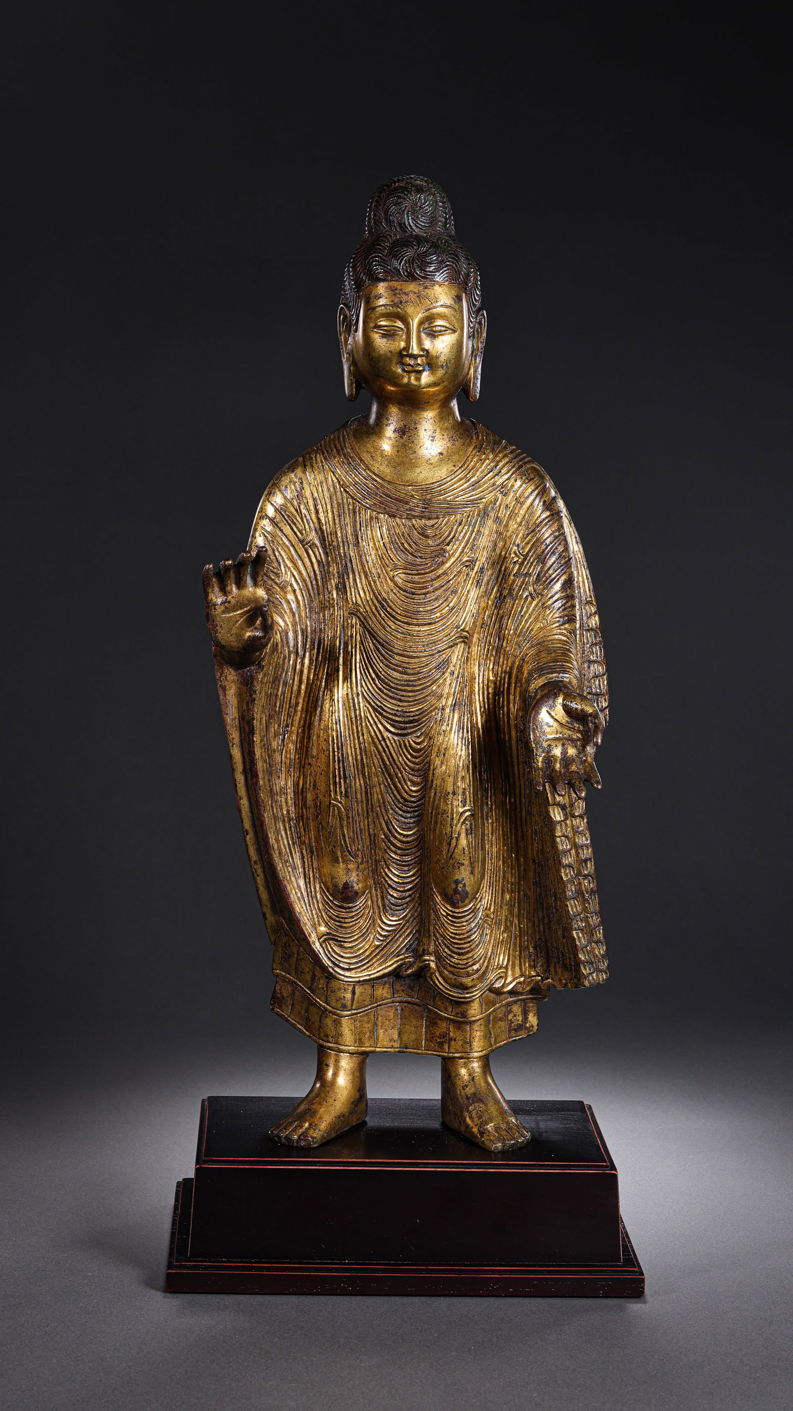 A GILT-BRONZE FIGURE OF BUDDHA (1 of 6)