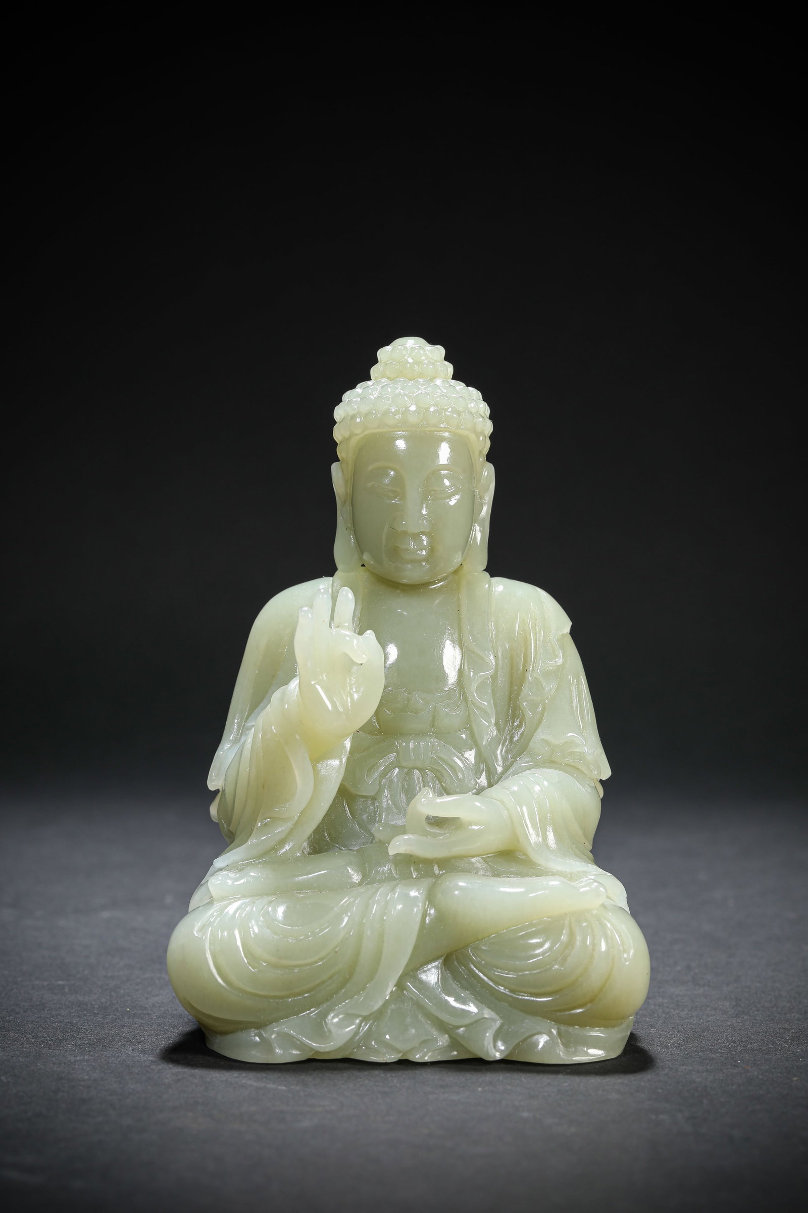 A JADE FIGURE OF BUDDHA (1 of 6)
