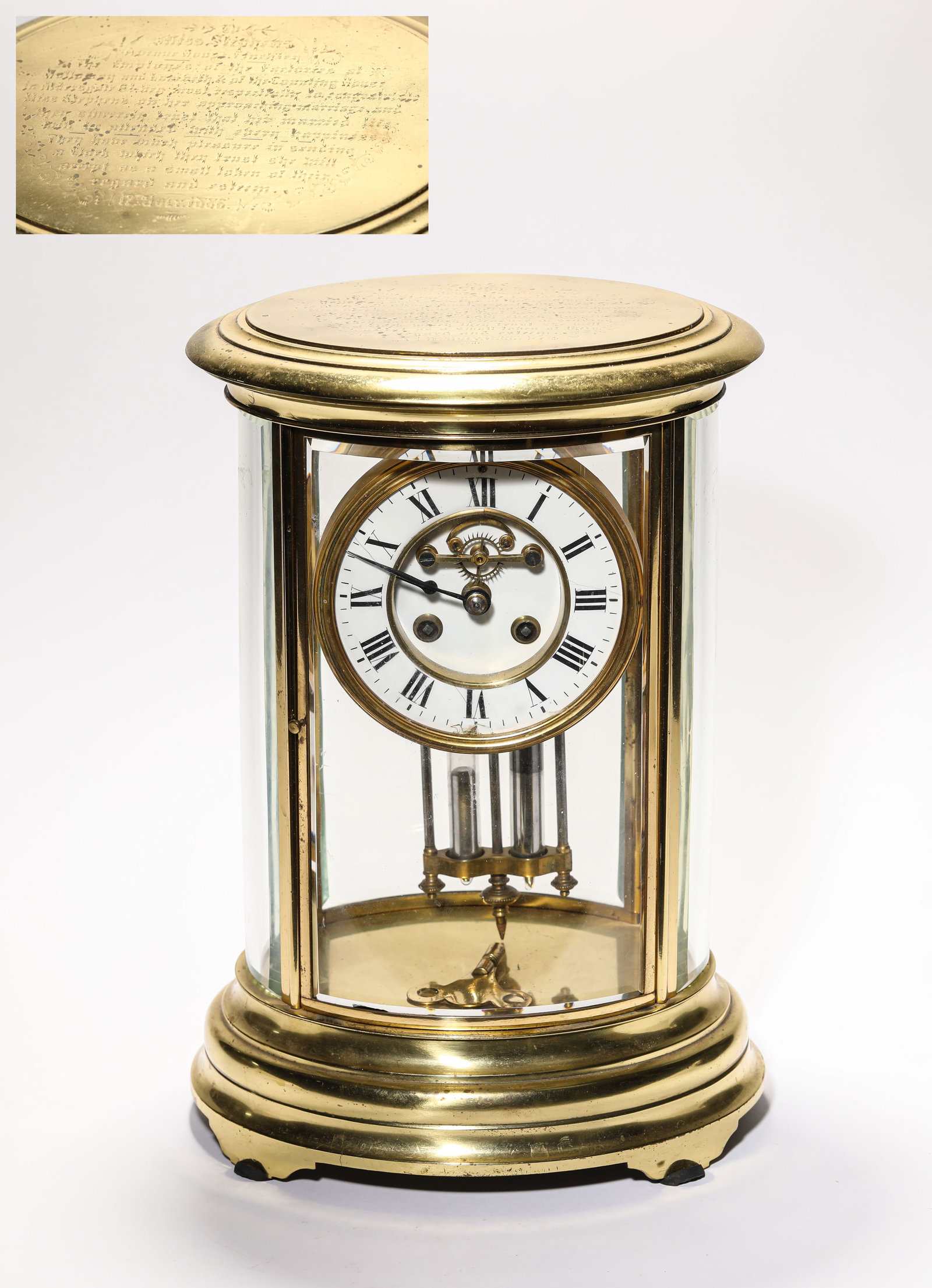 A GILT-BRONZE ATMOS CLOCK: A GILT-BRONZE ATMOS CLOCK Description: Dimensions: Weight: 6300 g. Length: 22.6 cm x Width: 18.6 cm x Height: 33.8 cm. All measurements are approximate.