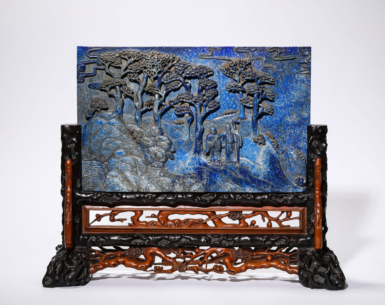 A LAPIS LAZULI 'CARVED SCHOLARS UNDER A PINE TREE' TABLE SCREEN: A LAPIS LAZULI 'CARVED SCHOLARS UNDER A PINE TREE' TABLE SCREEN Description: Dimensions: Length: 45 cm x Width: 15 cm x Height: 35.7 cm. All measurements are approximate.