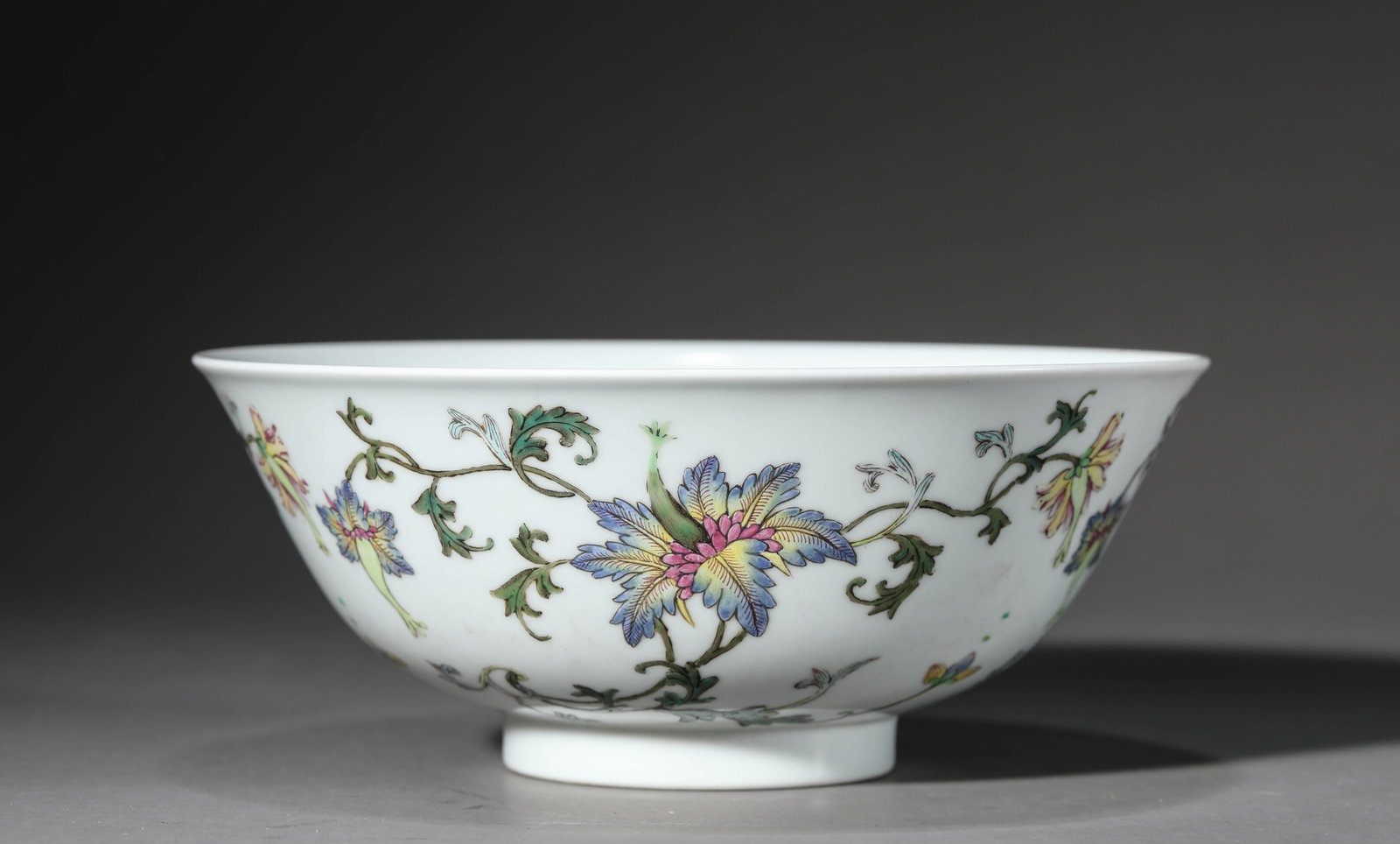 A FAMILLE-ROSE 'INTERLOCKING LOTUS' BOWL: A FAMILLE-ROSE 'INTERLOCKING LOTUS' BOWL Description: Dimensions: Width: 18.5 cm x Height: 7.6 cm. All measurements are approximate.