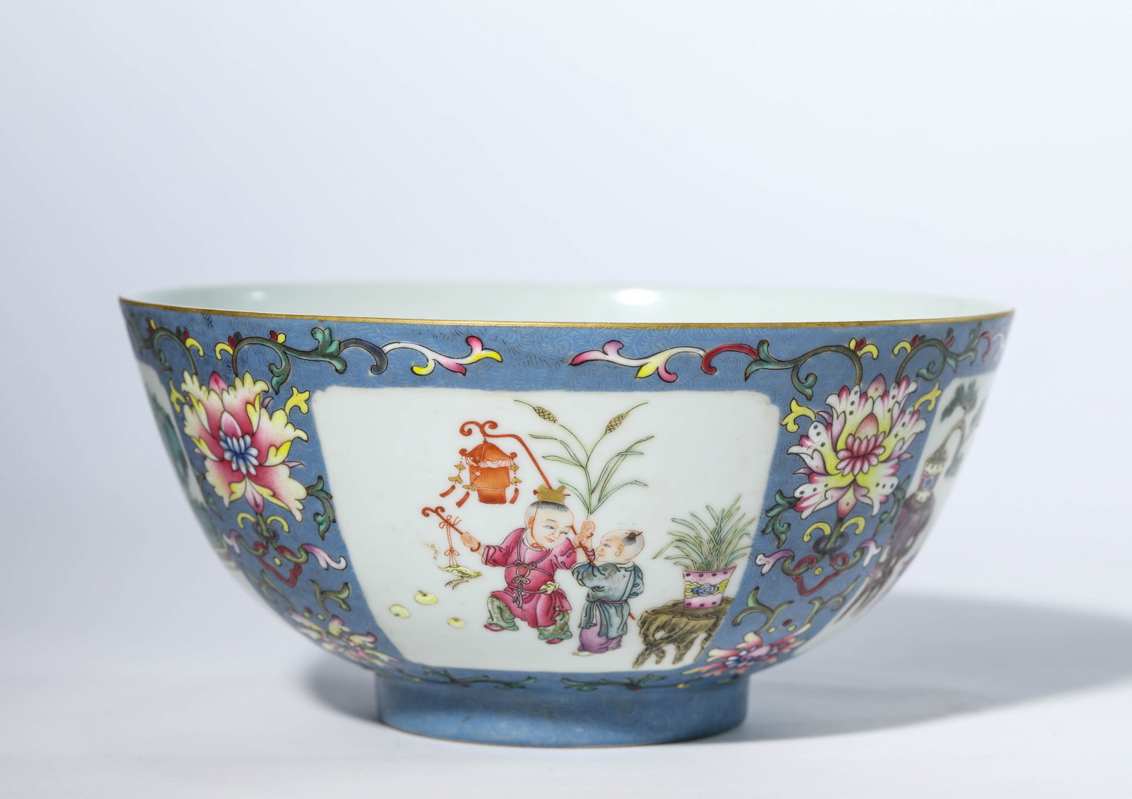 A SKY-BLUE-GLAZED FAMILLE-ROSE 'CHILDREN AT PLAY' BOWL: A SKY-BLUE-GLAZED FAMILLE-ROSE 'CHILDREN AT PLAY' BOWL Description: Dimensions: Width: 18.5 cm x Height: 9 cm. All measurements are approximate.