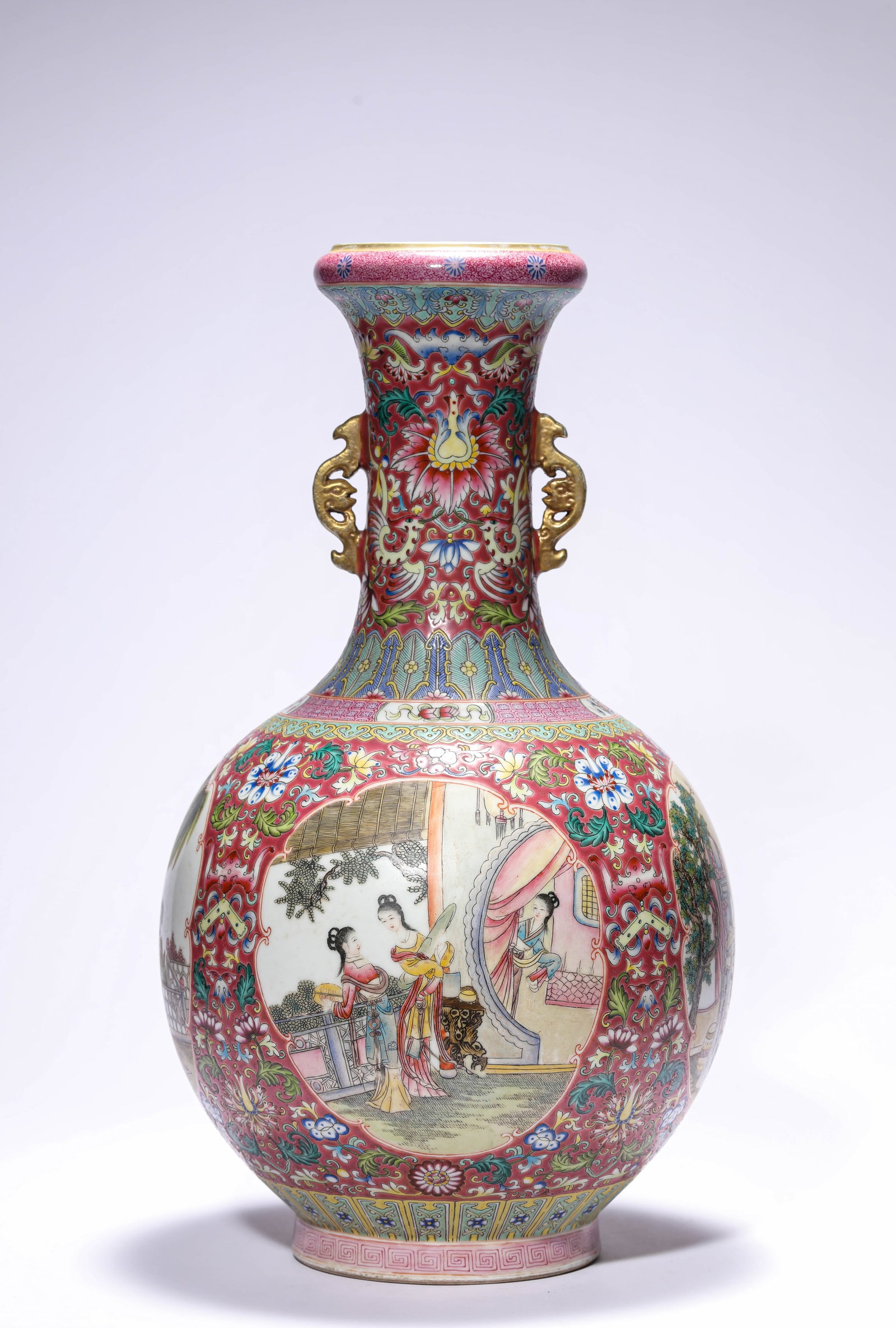 A ROUGE-GROUND FAMILLE-ROSE 'NARRATIVE SCENE' VASE: A ROUGE-GROUND FAMILLE-ROSE 'NARRATIVE SCENE' VASE Description: Dimensions: Width: 23.9 cm x Height: 42.5 cm. All measurements are approximate.