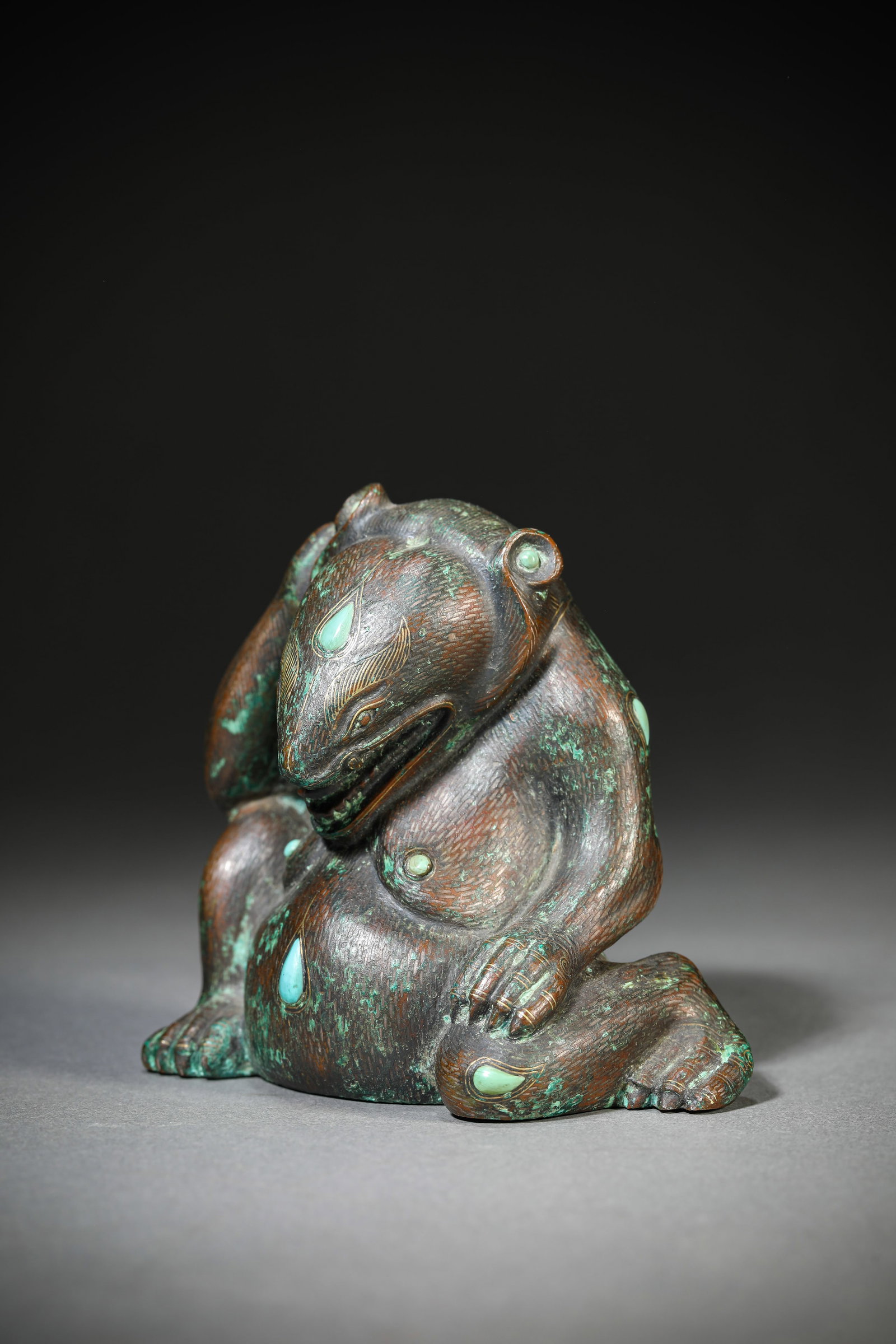 A TURQUOISE-INLAID BRONZE BEAR - 2