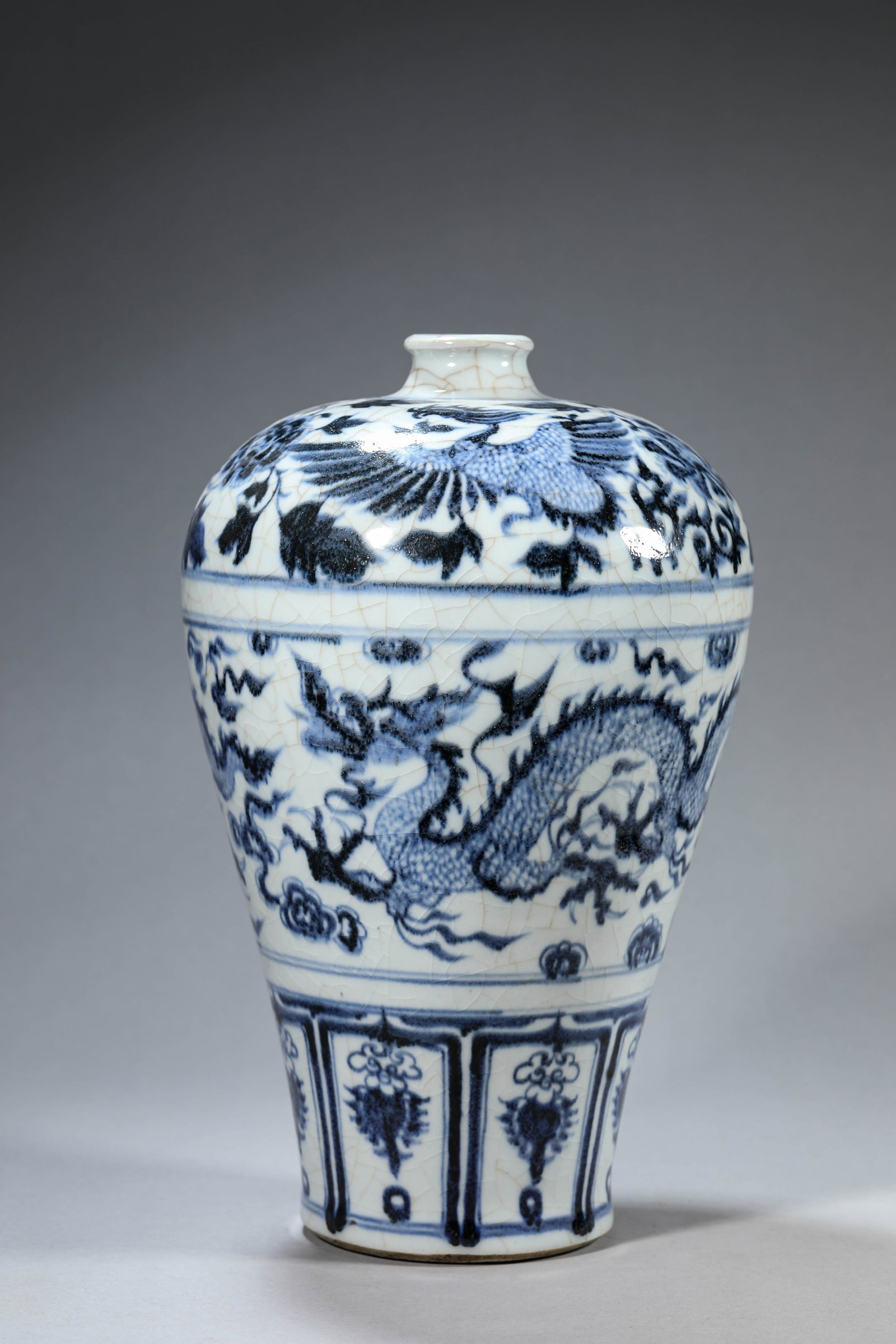 A BLUE AND WHITE 'DRAGON AND PHOENIX' MEIPING: A BLUE AND WHITE 'DRAGON AND PHOENIX' MEIPING Description: Dimensions: Width: 18.7 cm x Height: 29.9 cm. All measurements are approximate.