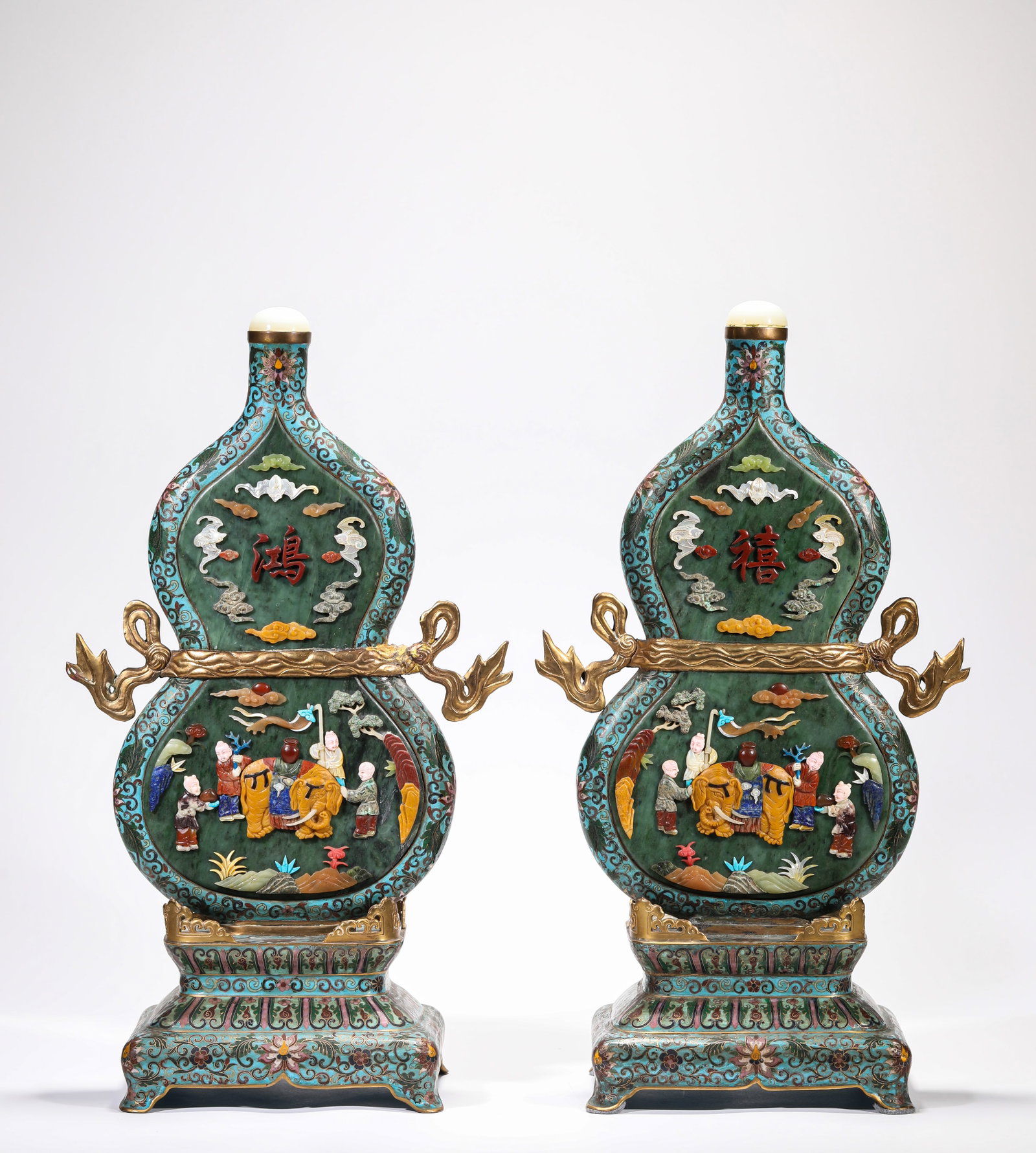 A PAIR OF CLOISONNE ENAMEL AND 'HUNDRED TREASURES'-INLAID 'DOUBLE-GOURD AND POEM' ORNAMENTS: A PAIR OF CLOISONNE ENAMEL AND 'HUNDRED TREASURES'-INLAID 'DOUBLE-GOURD AND POEM' ORNAMENTS Description: Dimensions: Weight: 4100 g. Length: 28.5 cm x Width: 16.2 cm x Height: 50 cm. All measurements