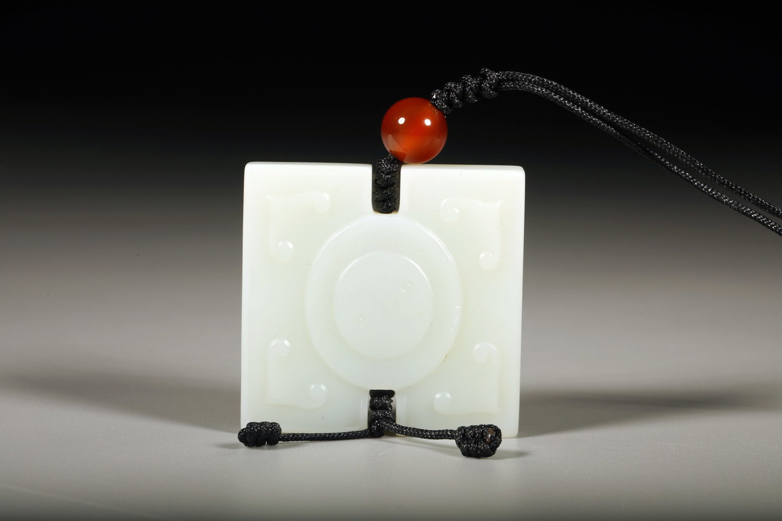 A WHITE JADE 'EIGHT TRIGRAMS' PENDANT - 2