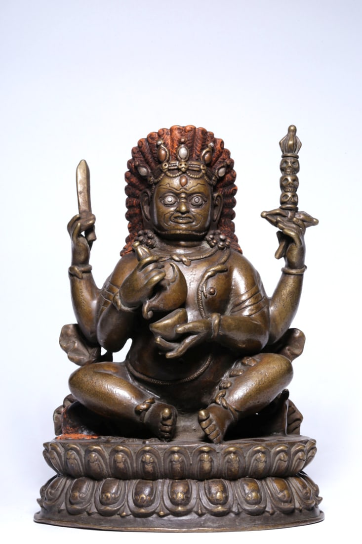 A BRONZE FIGURE OF SEATED VISHVA-VAJRA, INLAID WITH SILVER: A BRONZE FIGURE OF SEATED VISHVA-VAJRA, INLAID WITH SILVER Size:Height:17.5cm,Length:12.5cm,Width:9.5cm;Weight:1395grams