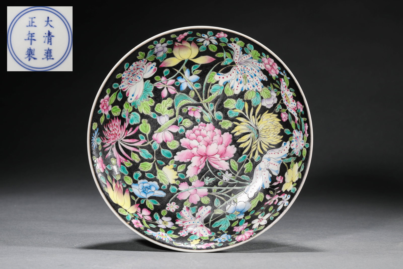 A FAMILLE ROSE DISH WITH HUNDRED FLOWERS MOTIFS ON BLACK GROUND (1 of 8)