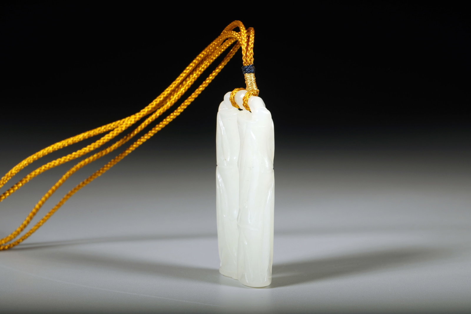 A WHITE JADE 'BAMBOO' BOULDER - 3