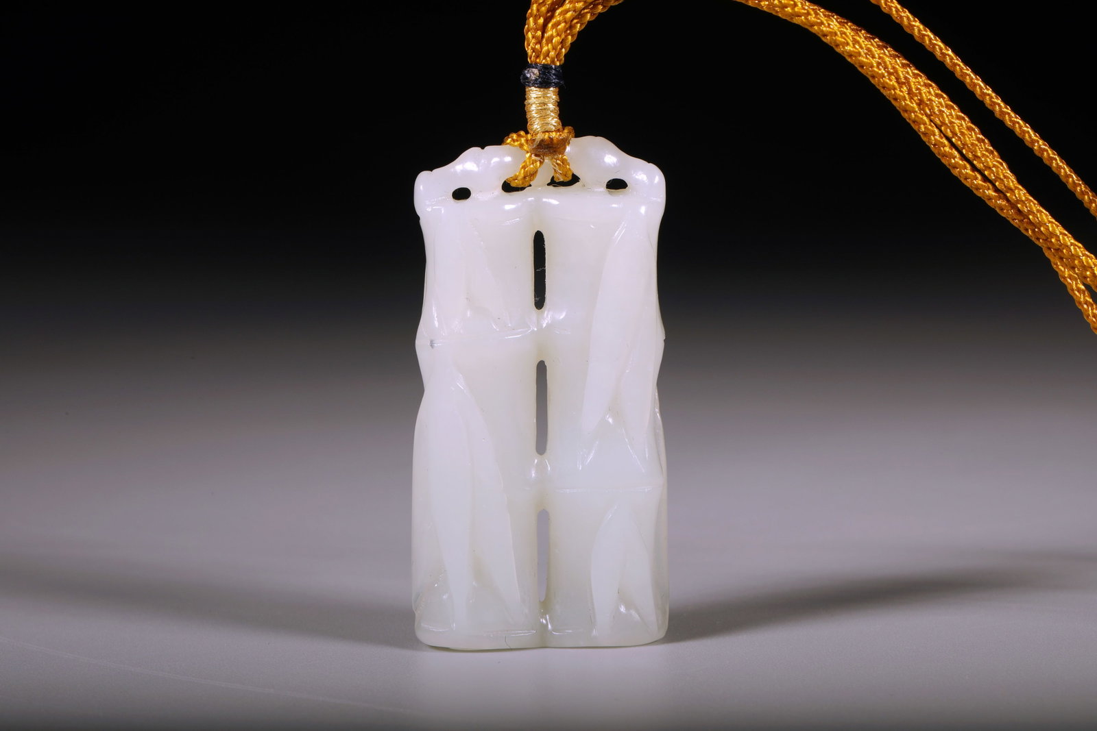 A WHITE JADE 'BAMBOO' BOULDER - 5