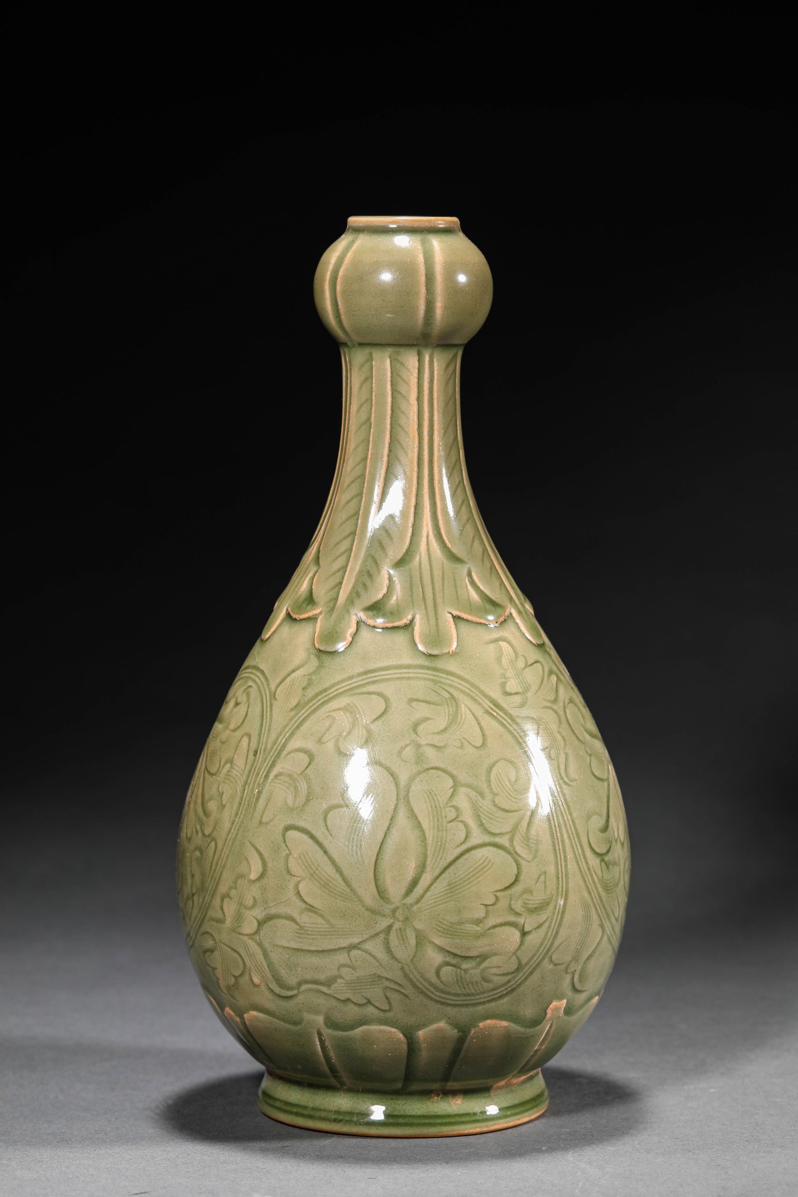 A YAOZHOU WARE GARLIC-HEAD VASE WITH ANHUA CARVED FLORAL MOTIFS (1 of 6)