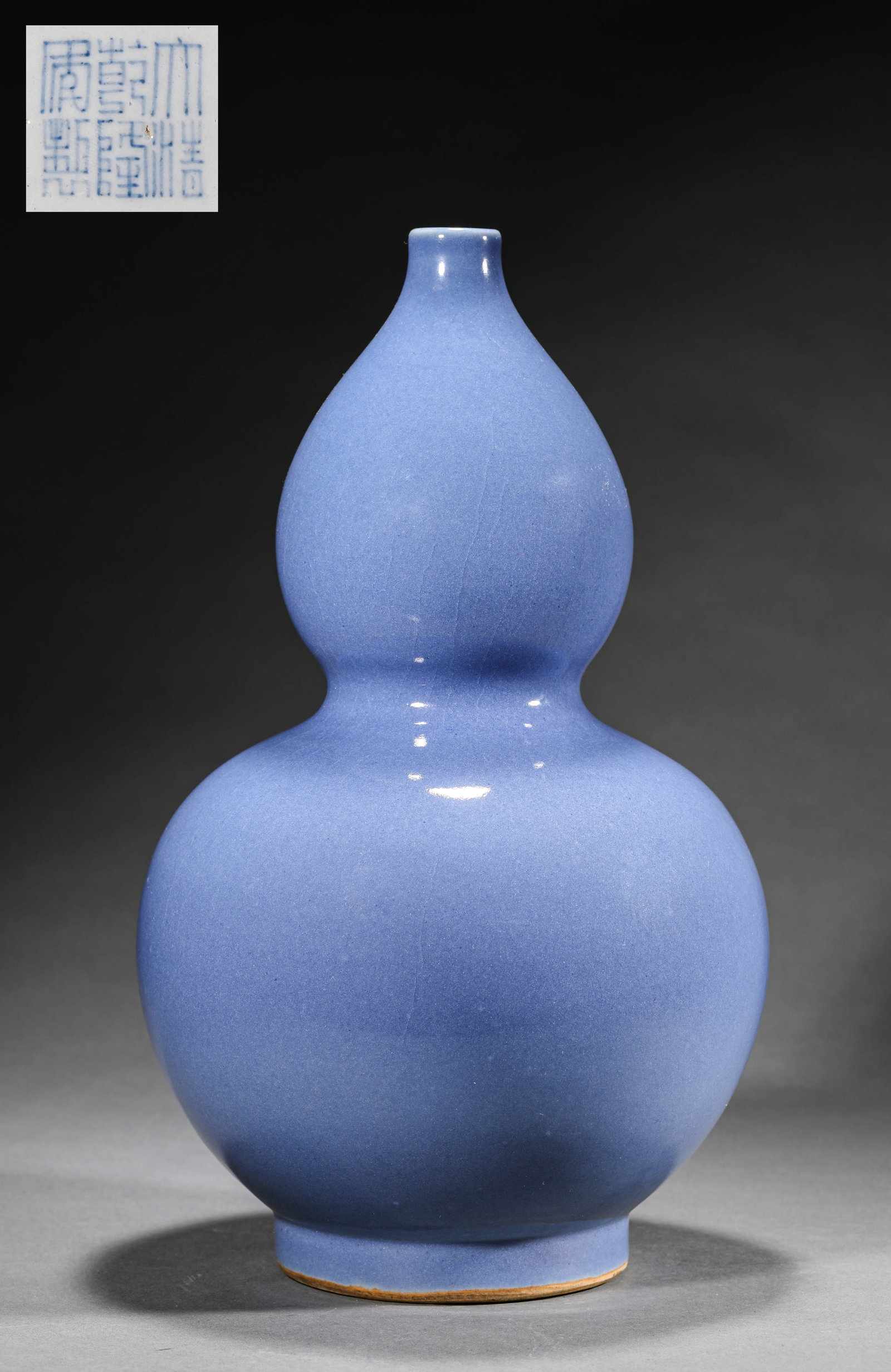 A SKY BLUE GLAZED GOURD VASE: A SKY BLUE GLAZED GOURD VASE Size:Diam:18cm,Height:33cm