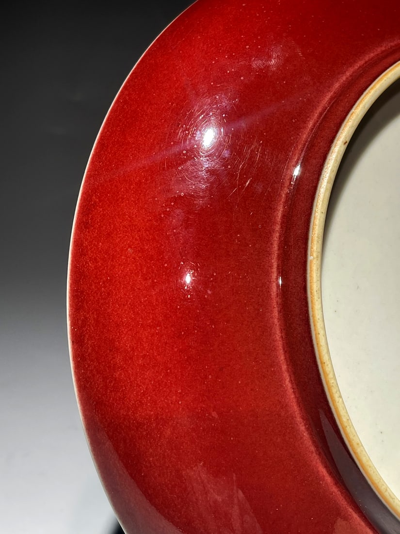 A SACRIFICIAL RED-GLAZED DISH - 9