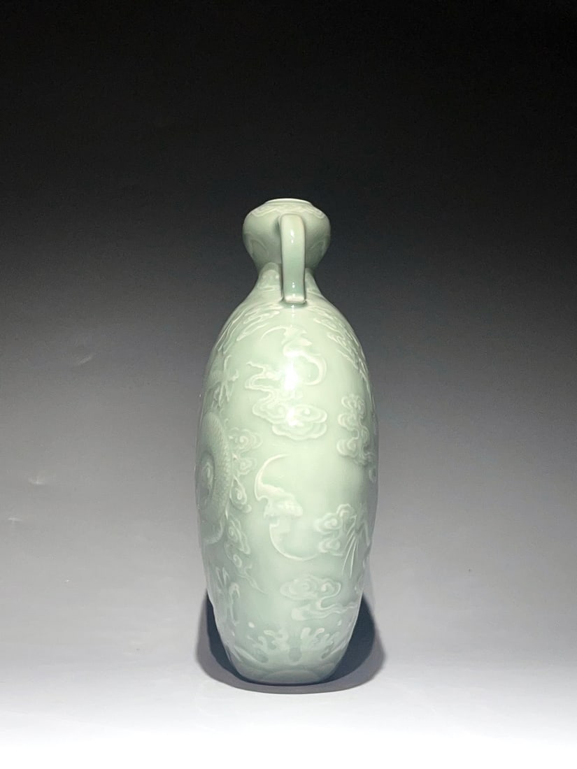 A CELADON-GLAZED 'DRAGON AND CLOUDS' MOONFLASK WITH LOOP HANDLES - 5