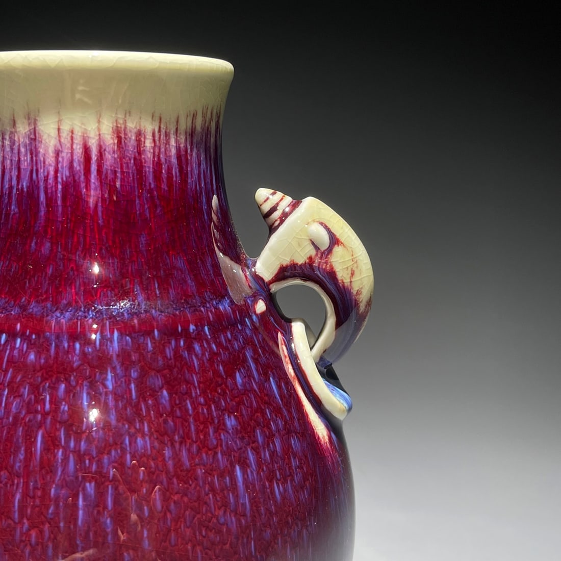 A FLAMBE GLAZED BAT EARED VASE - 8