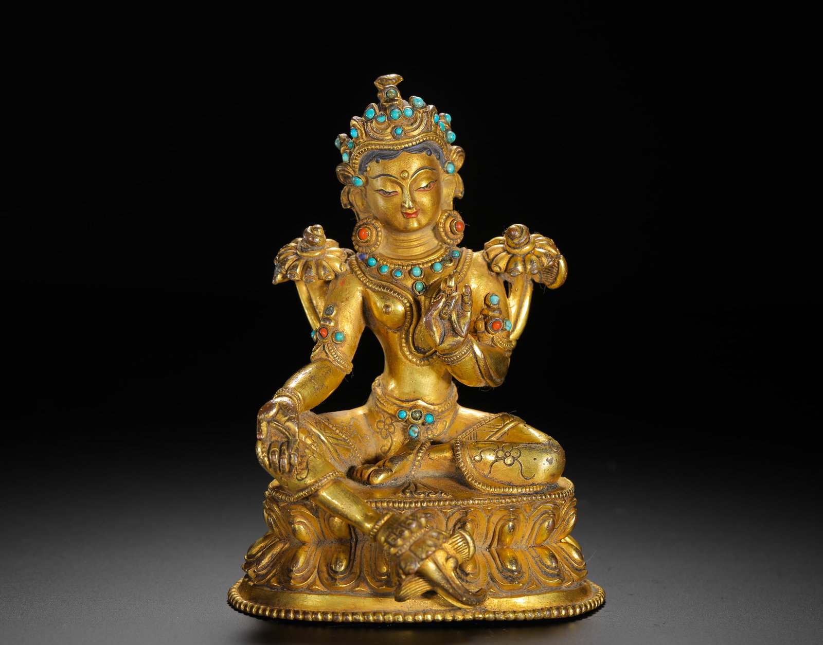 BRONZE GILDED STATUE OF THE GREEN TARA INLAID WITH TURQUOISE: BRONZE GILDED STATUE OF THE GREEN TARA INLAID WITH TURQUOISE (13.3 x 8.8cm,Weight:520g)