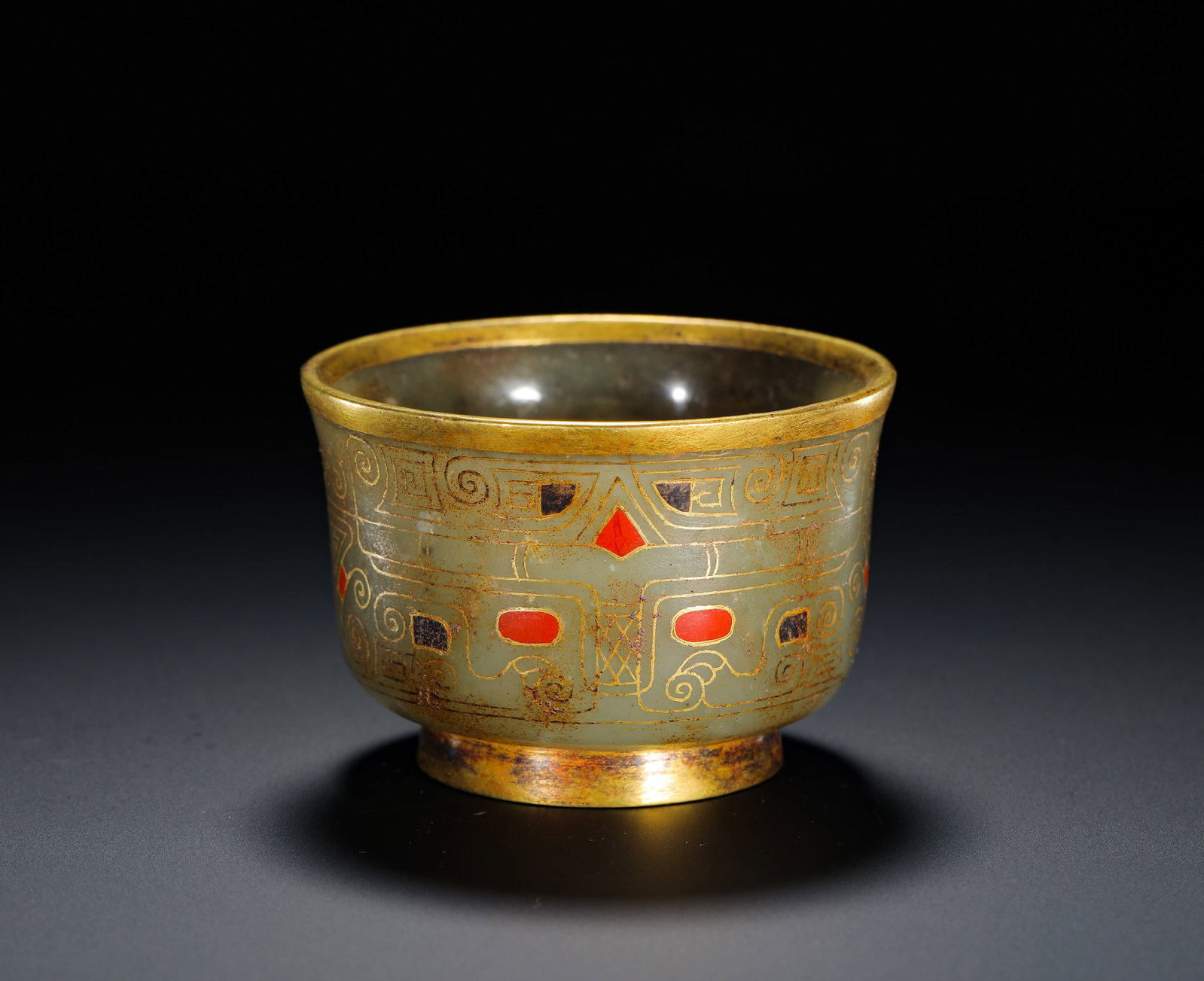 HETIAN JADE CUP WITH GOLD INLAID AND ANIMAL FACE PATTERNS: HETIAN JADE CUP WITH GOLD INLAID AND ANIMAL FACE PATTERNS (5 x 7.2cm,Weight:140g)
