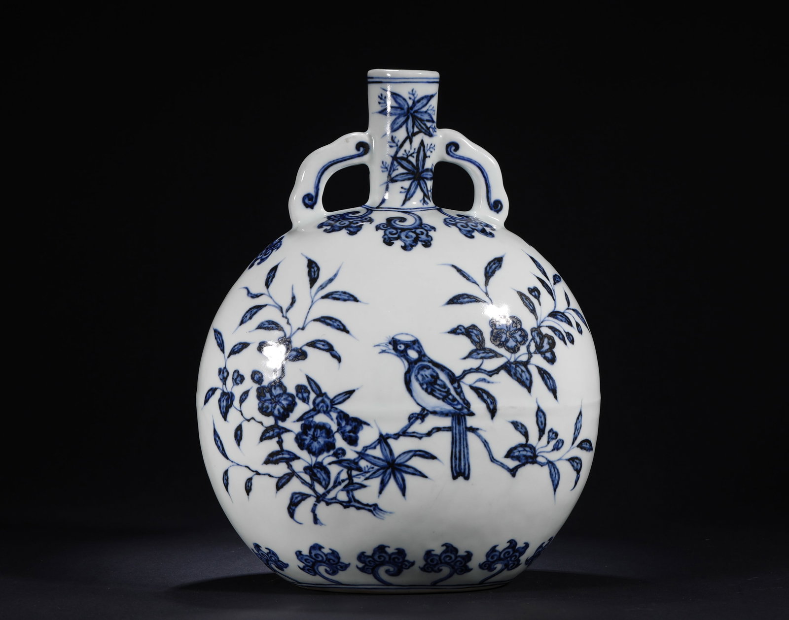 BLUE AND WHITE FLOWER-AND-BIRD PATTERN MOON-HUGGING VASE: BLUE AND WHITE FLOWER-AND-BIRD PATTERN MOON-HUGGING VASE (30 x 19cm)