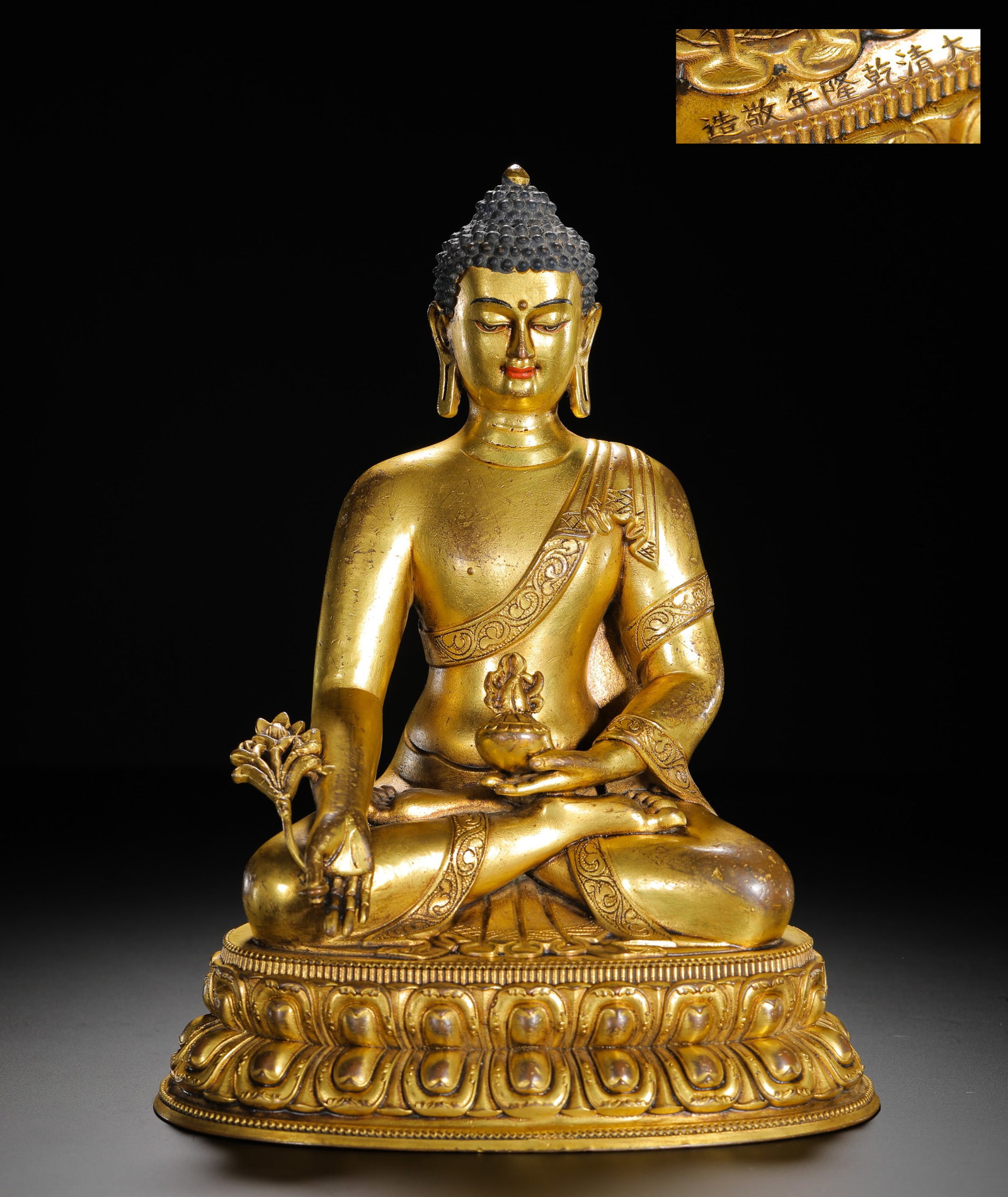 A GILDED BRONZE SEATED STATUE OF THE MEDICINE BUDDHA (1 of 12)