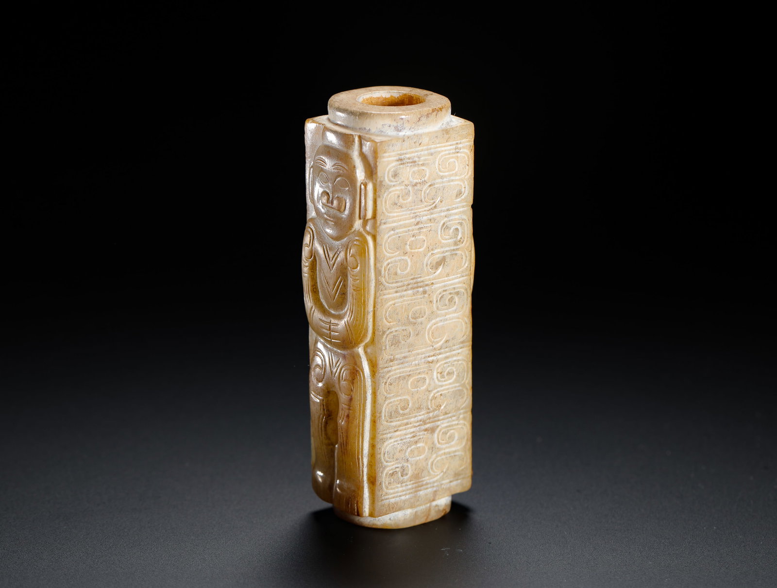A JADE FIGURE WITH A PATTERNED LEZI - 3