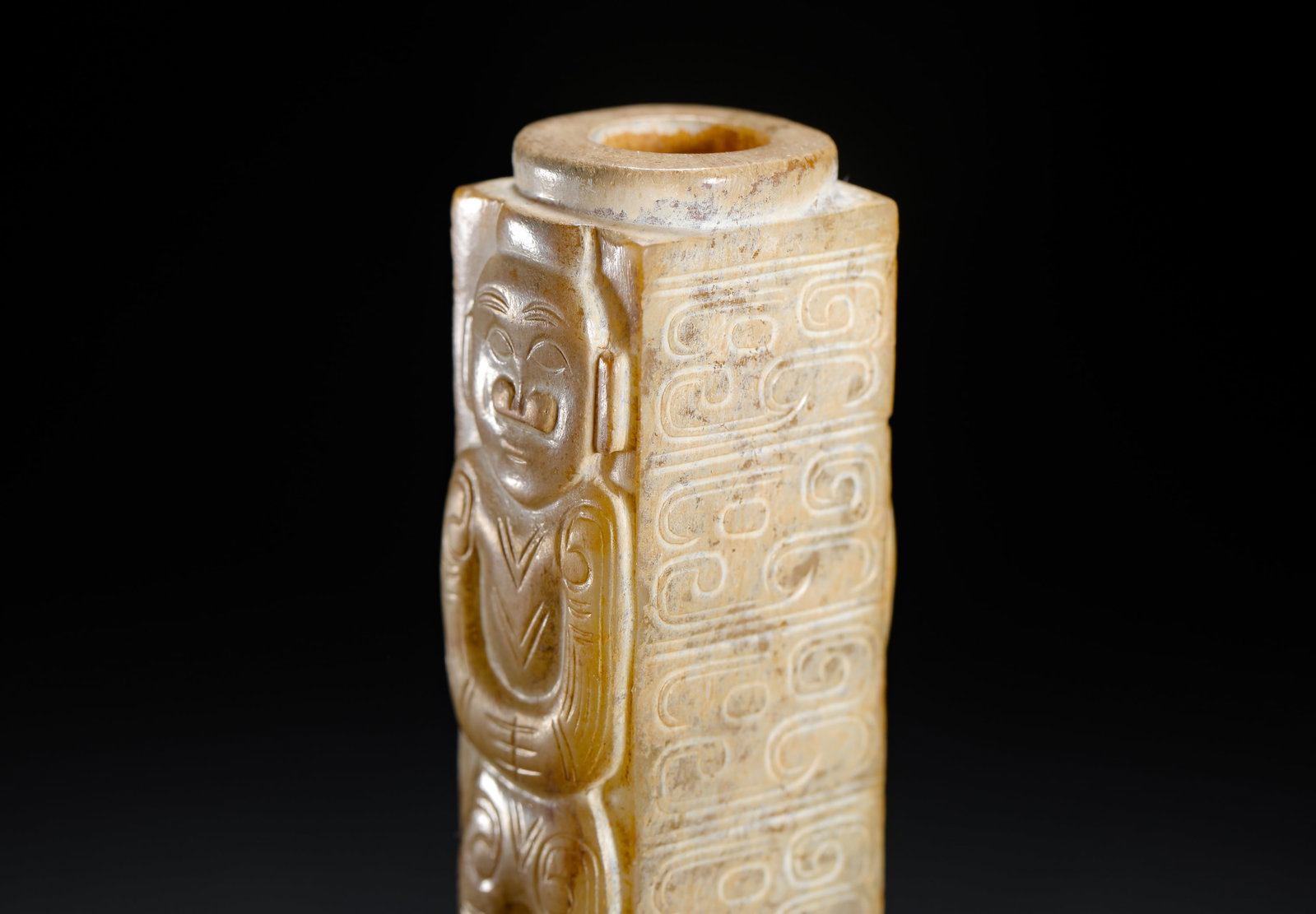 A JADE FIGURE WITH A PATTERNED LEZI - 4