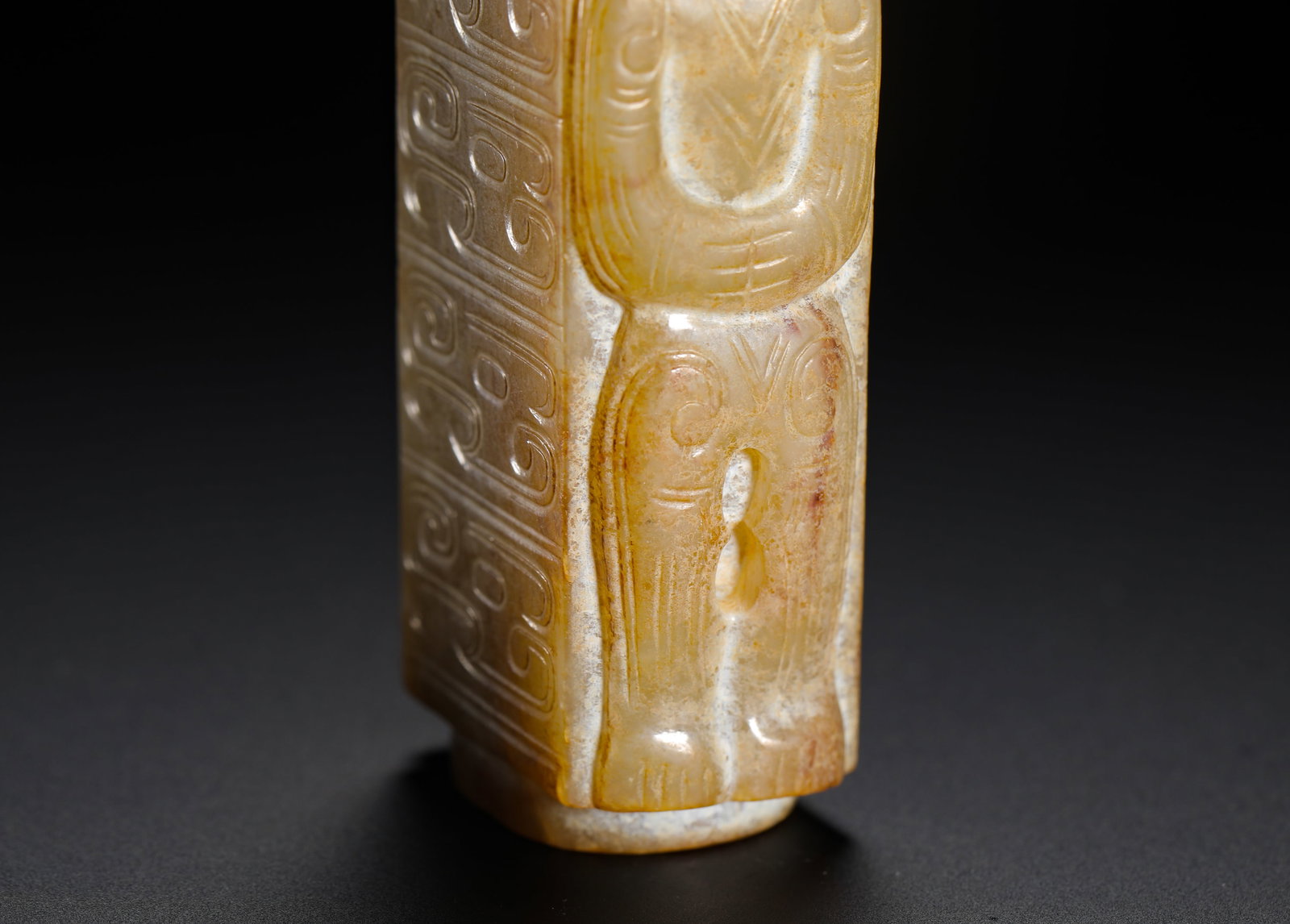 A JADE FIGURE WITH A PATTERNED LEZI - 7