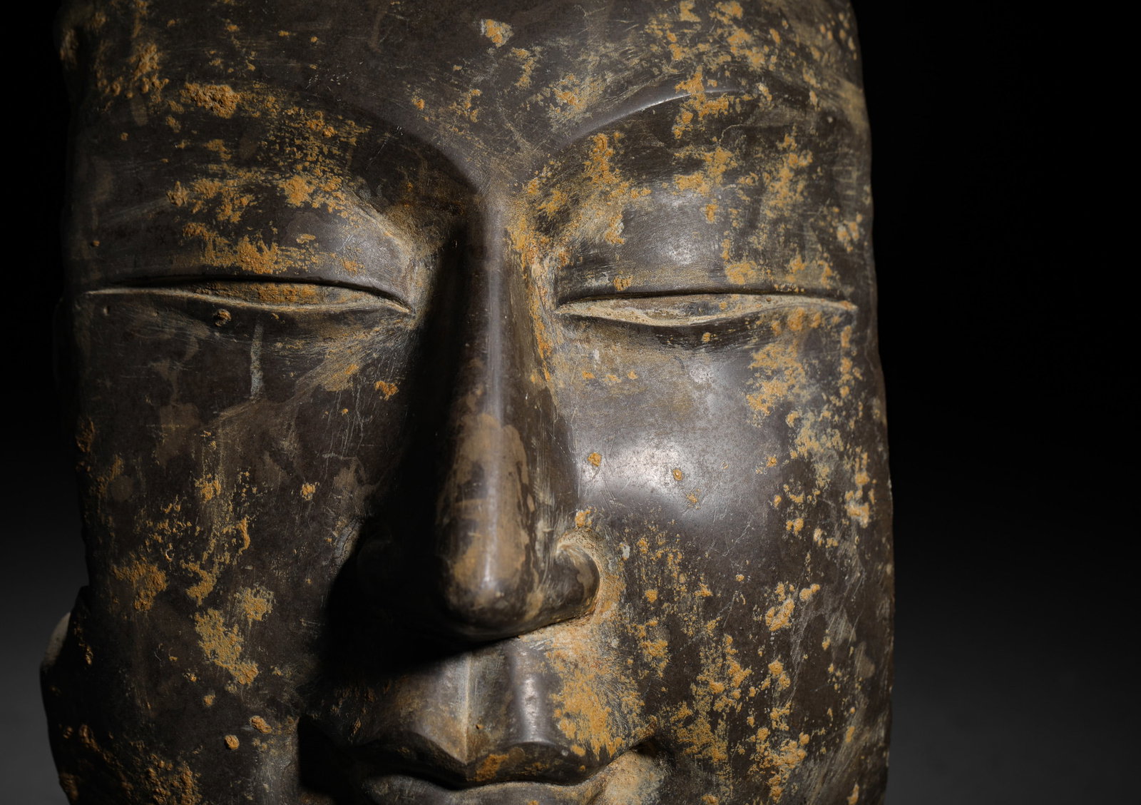 STONE-CARVED BUDDHA HEADS - 4