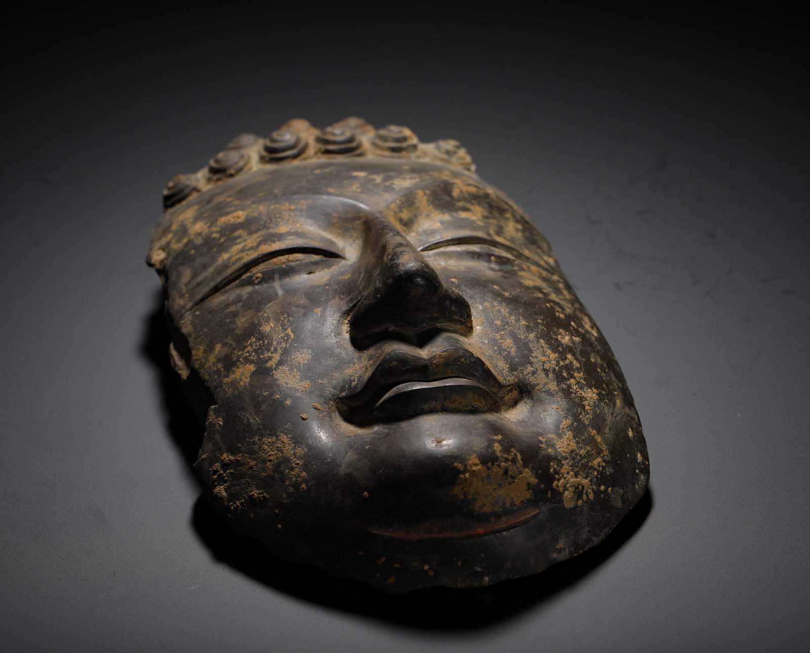 STONE-CARVED BUDDHA HEADS - 7