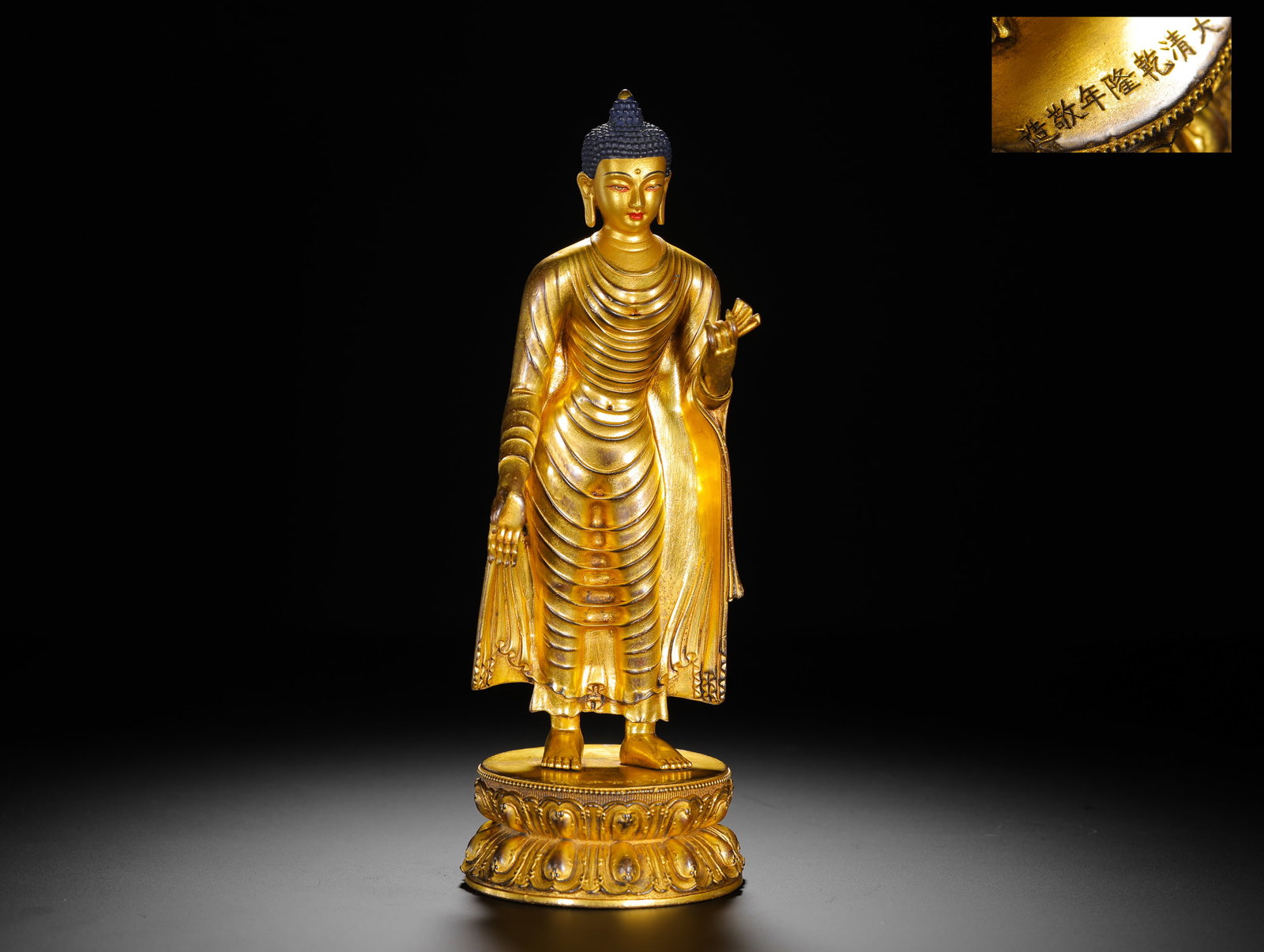 A GILDED BRONZE STANDING STATUE OF SAKYAMUNI BUDDHA: A GILDED BRONZE STANDING STATUE OF SAKYAMUNI BUDDHA (23 x 8cm,Weight:700g)