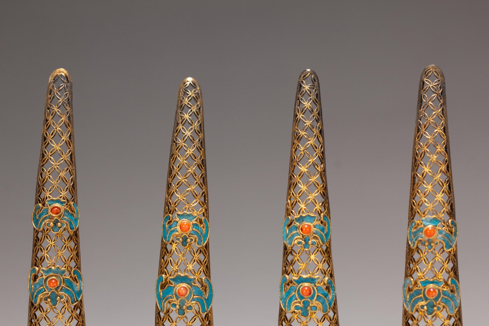 FOUR CHINESE GILT SILVER GEM-SET NAIL GUARDS - 2