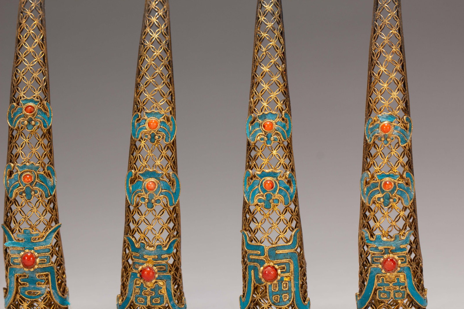 FOUR CHINESE GILT SILVER GEM-SET NAIL GUARDS - 3