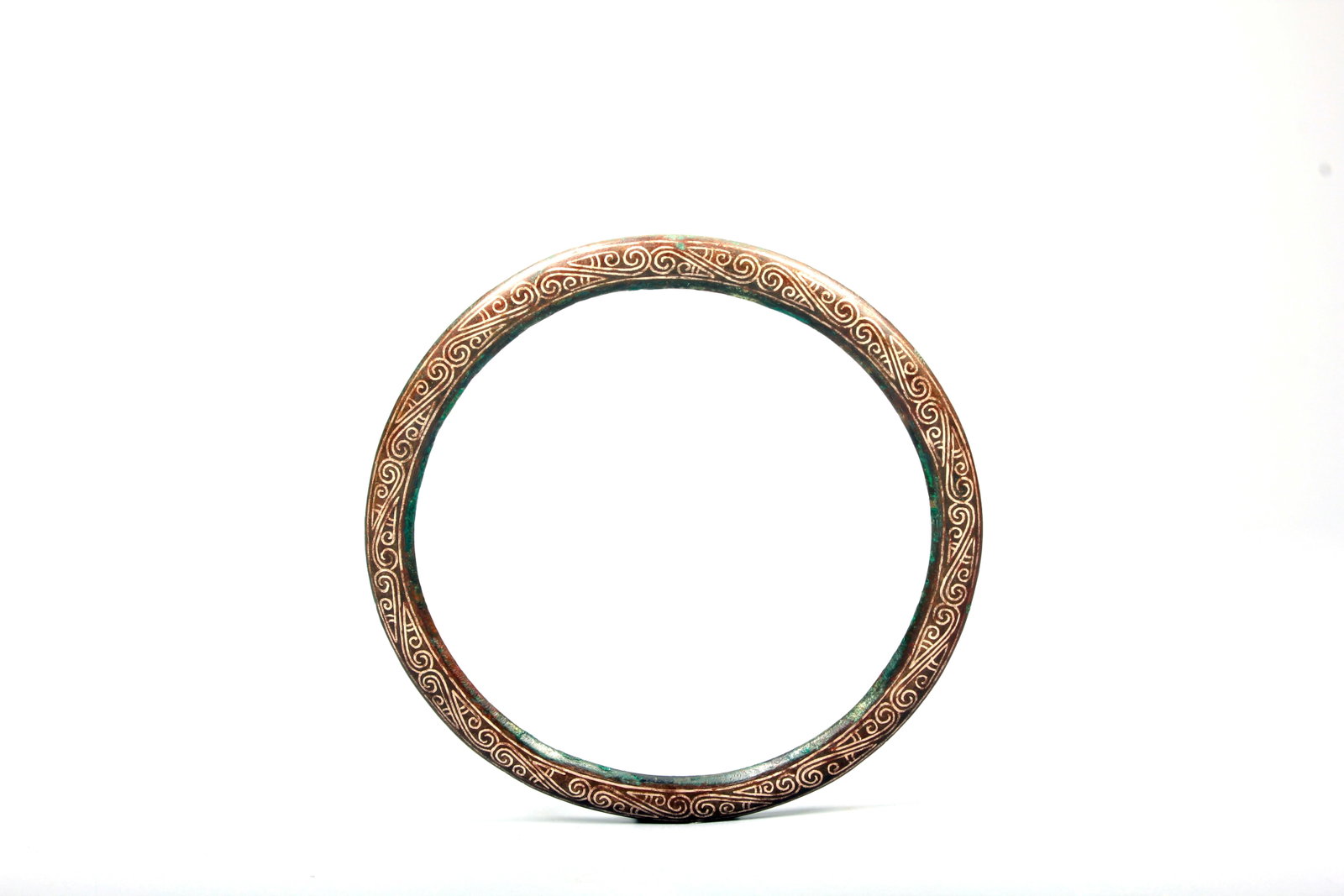 A SILVER-INLAID BRONZE LOOP - 5